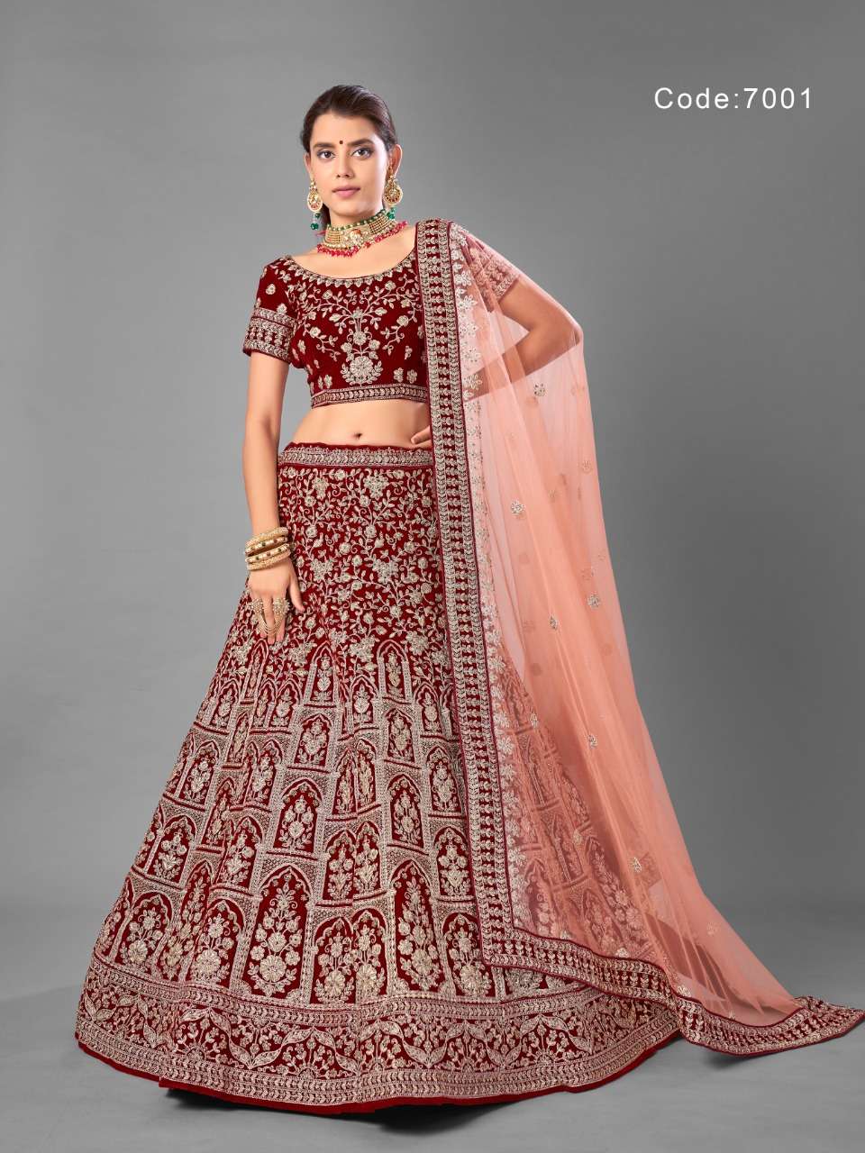 ARYA VOL-18 BY ARYA DESIGNS 7001 TO 7012 SERIES DESIGNER BEAUTIFUL WEDDING COLLECTION OCCASIONAL WEAR & PARTY WEAR VELVET LEHENGAS AT WHOLESALE PRICE