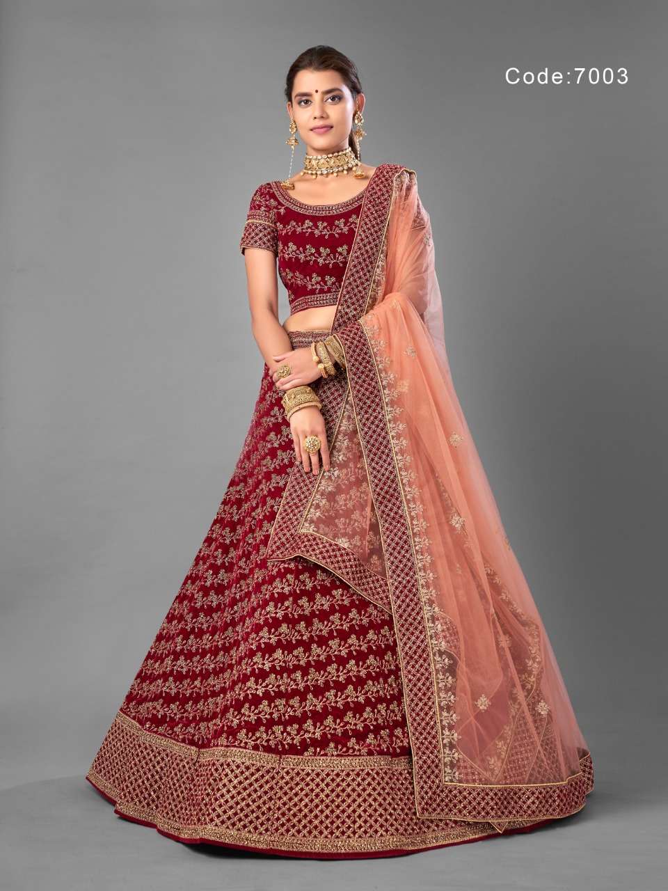 ARYA VOL-18 BY ARYA DESIGNS 7001 TO 7012 SERIES DESIGNER BEAUTIFUL WEDDING COLLECTION OCCASIONAL WEAR & PARTY WEAR VELVET LEHENGAS AT WHOLESALE PRICE