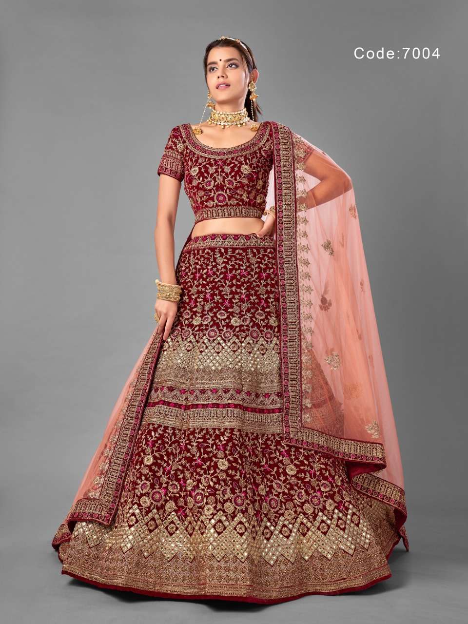 ARYA VOL-18 BY ARYA DESIGNS 7001 TO 7012 SERIES DESIGNER BEAUTIFUL WEDDING COLLECTION OCCASIONAL WEAR & PARTY WEAR VELVET LEHENGAS AT WHOLESALE PRICE