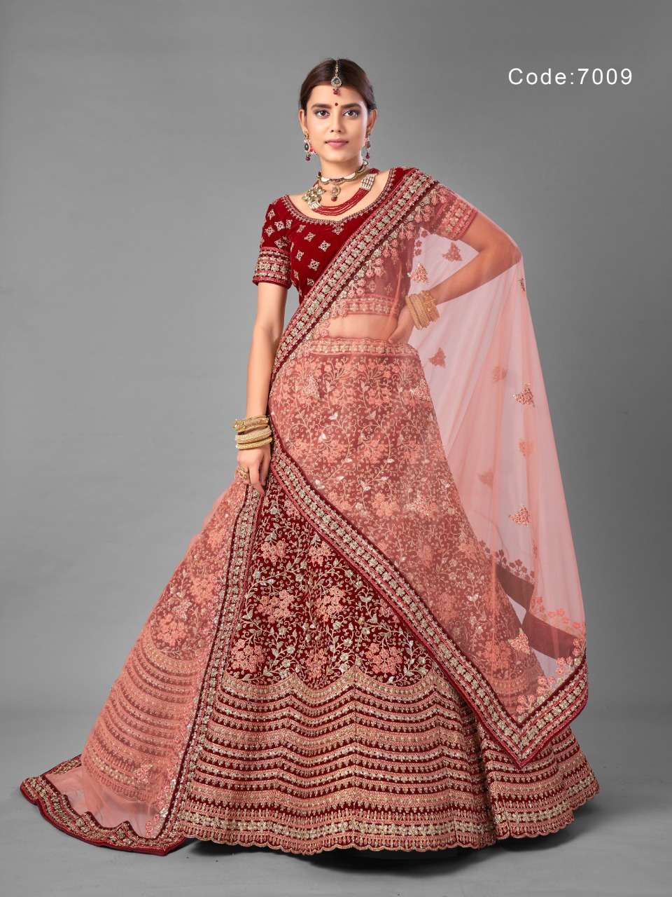 ARYA VOL-18 BY ARYA DESIGNS 7001 TO 7012 SERIES DESIGNER BEAUTIFUL WEDDING COLLECTION OCCASIONAL WEAR & PARTY WEAR VELVET LEHENGAS AT WHOLESALE PRICE