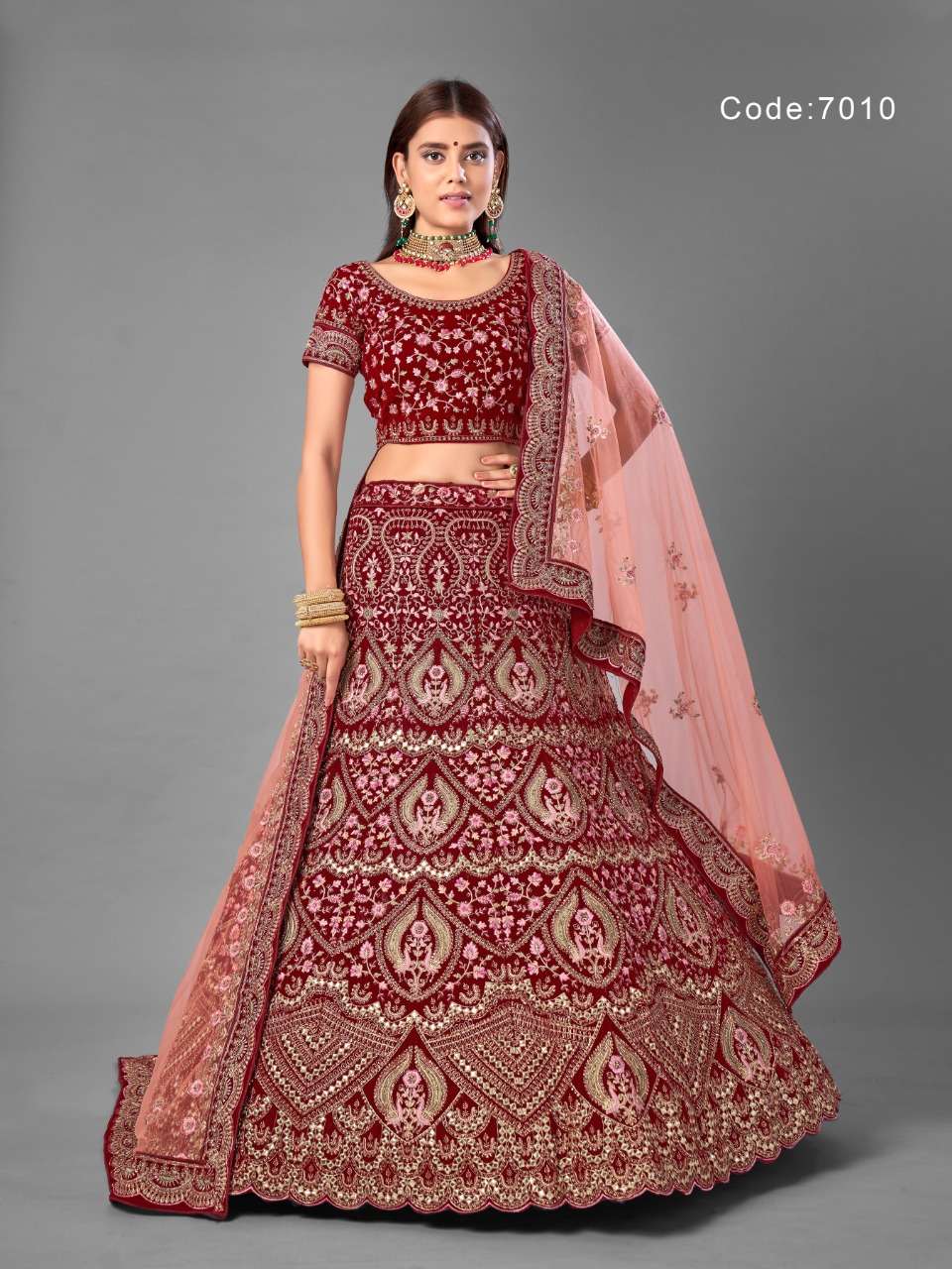 ARYA VOL-18 BY ARYA DESIGNS 7001 TO 7012 SERIES DESIGNER BEAUTIFUL WEDDING COLLECTION OCCASIONAL WEAR & PARTY WEAR VELVET LEHENGAS AT WHOLESALE PRICE