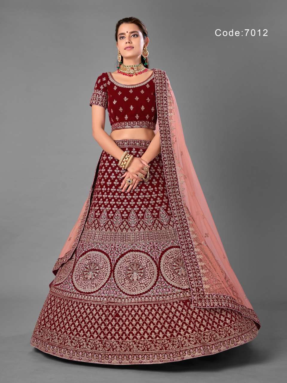 ARYA VOL-18 BY ARYA DESIGNS 7001 TO 7012 SERIES DESIGNER BEAUTIFUL WEDDING COLLECTION OCCASIONAL WEAR & PARTY WEAR VELVET LEHENGAS AT WHOLESALE PRICE