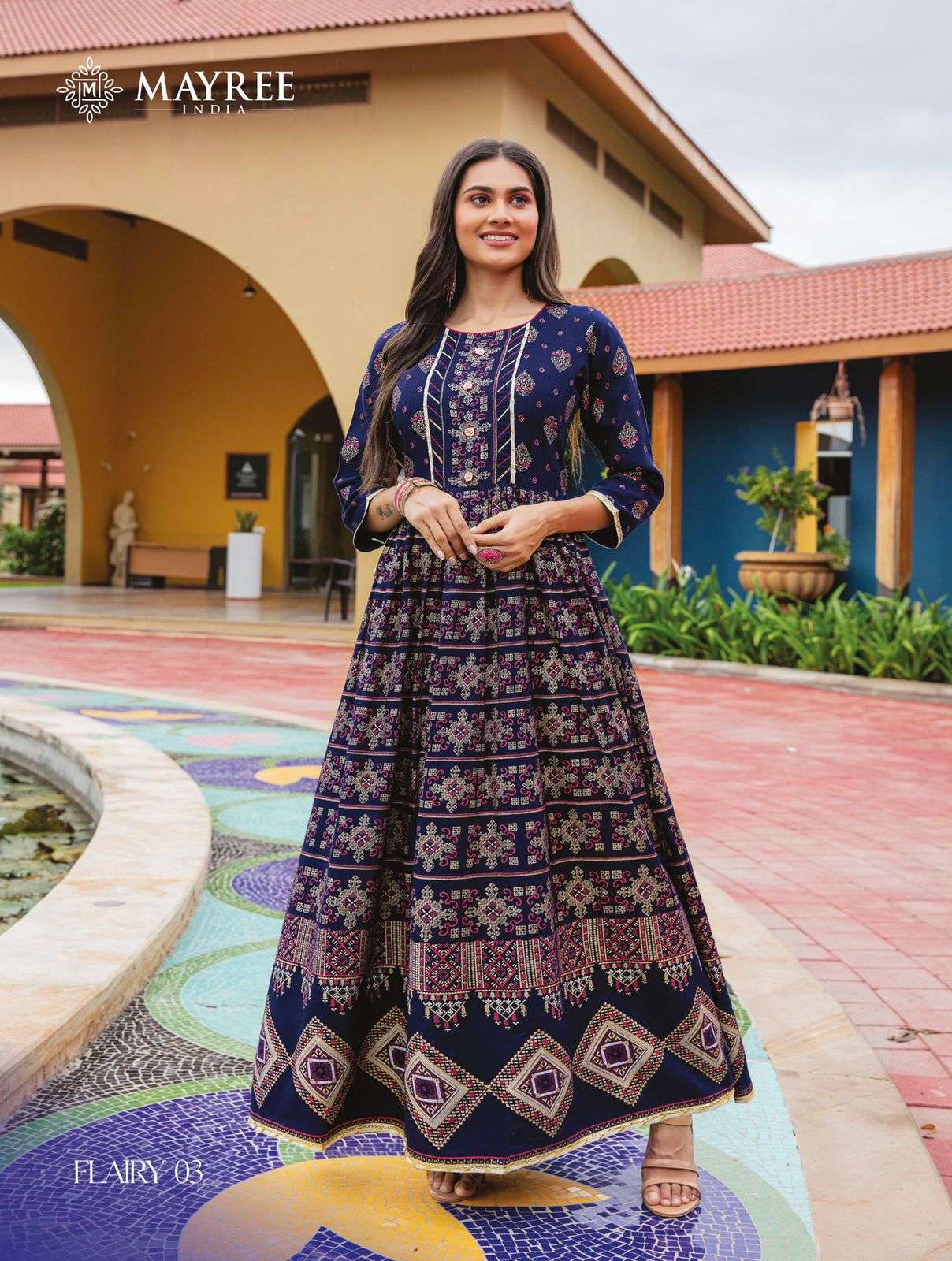 FLAIRY BY MAYREE 01 TO 06 SERIES BEAUTIFUL STYLISH FANCY COLORFUL CASUAL WEAR & ETHNIC WEAR HEAVY SILK PRINT GOWNS AT WHOLESALE PRICE
