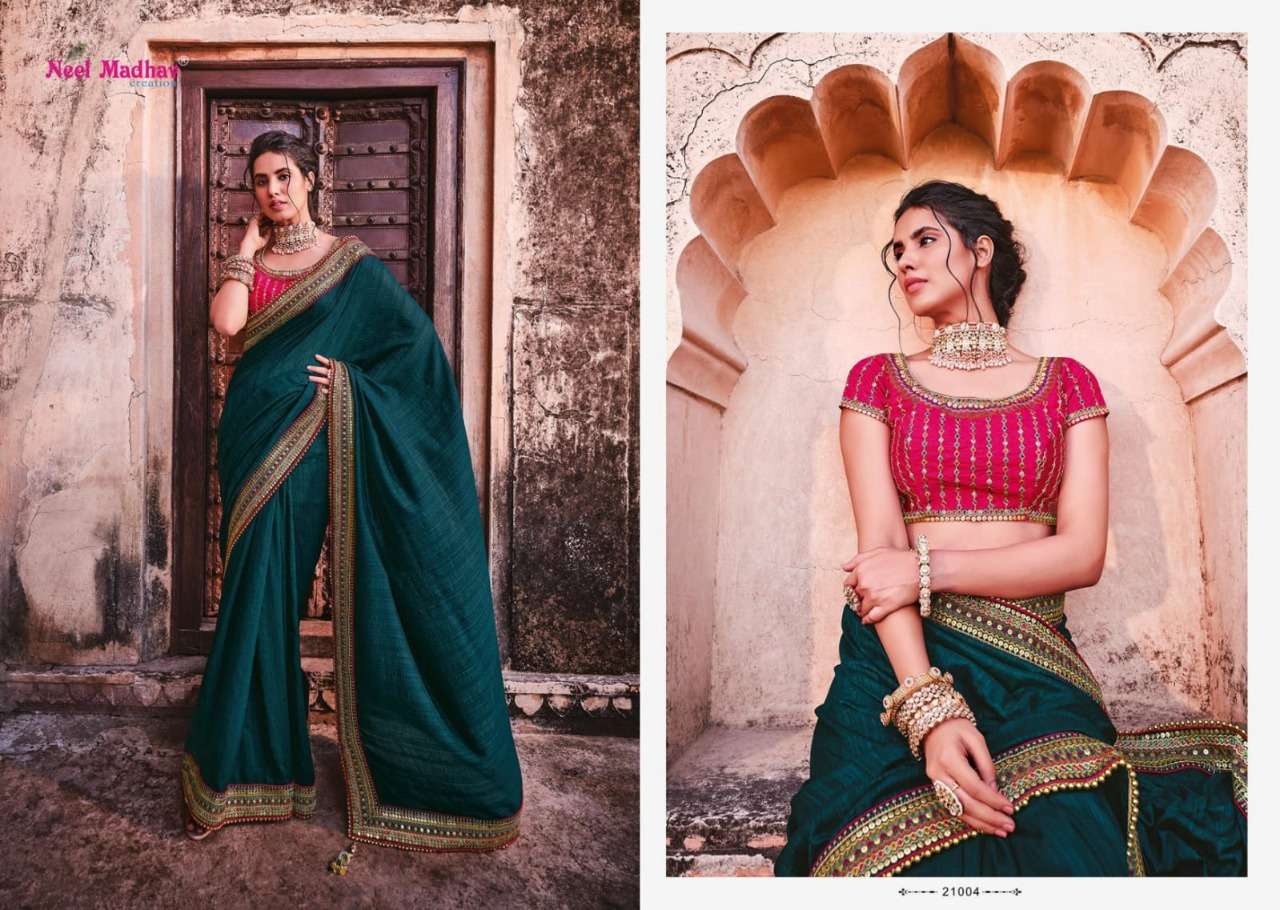 MIRISHA BY NEEL MADHAV 21001 TO 21015 SERIES INDIAN TRADITIONAL WEAR COLLECTION BEAUTIFUL STYLISH FANCY COLORFUL PARTY WEAR & OCCASIONAL WEAR FANCY SAREES AT WHOLESALE PRICE