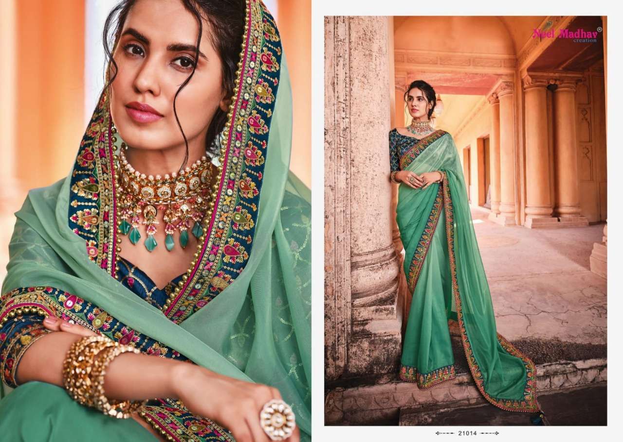 MIRISHA BY NEEL MADHAV 21001 TO 21015 SERIES INDIAN TRADITIONAL WEAR COLLECTION BEAUTIFUL STYLISH FANCY COLORFUL PARTY WEAR & OCCASIONAL WEAR FANCY SAREES AT WHOLESALE PRICE