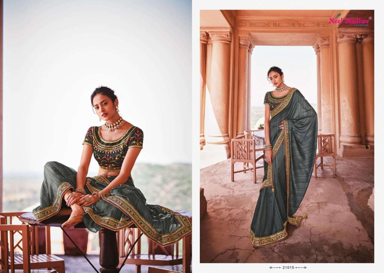 MIRISHA BY NEEL MADHAV 21001 TO 21015 SERIES INDIAN TRADITIONAL WEAR COLLECTION BEAUTIFUL STYLISH FANCY COLORFUL PARTY WEAR & OCCASIONAL WEAR FANCY SAREES AT WHOLESALE PRICE