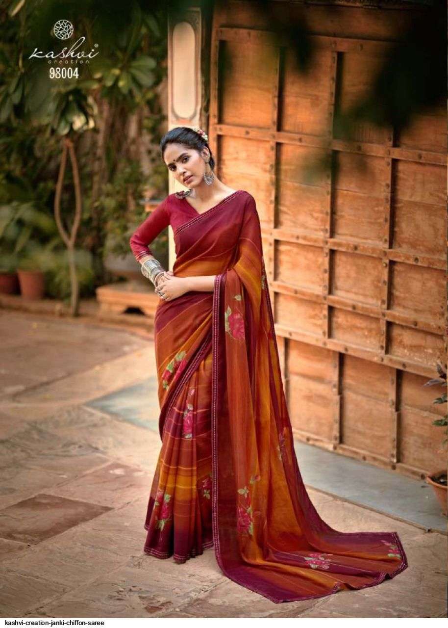 JANKI BY KASHVI CREATION 98001 TO 98010 SERIES INDIAN TRADITIONAL WEAR COLLECTION BEAUTIFUL STYLISH FANCY COLORFUL PARTY WEAR & OCCASIONAL WEAR CHIFFON SAREES AT WHOLESALE PRICE
