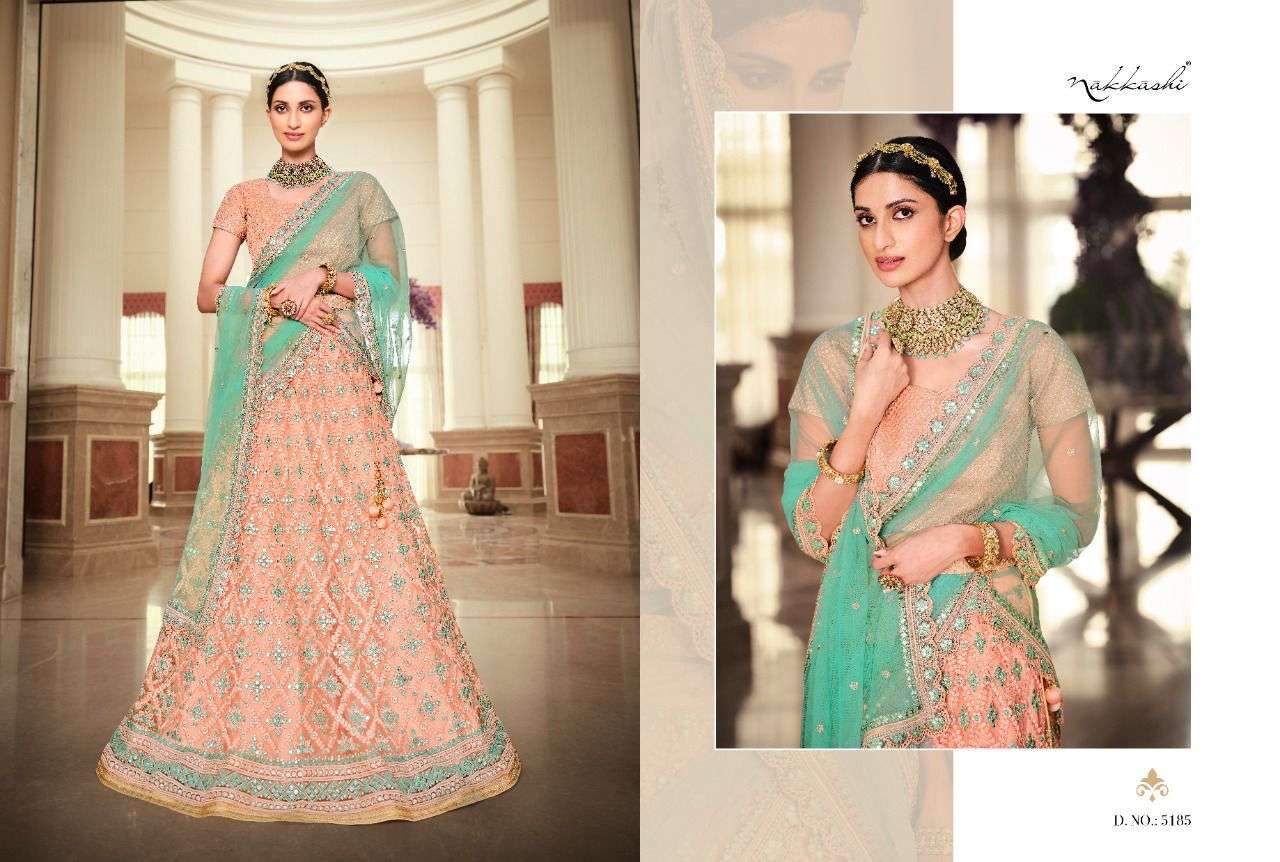 GLAMOUR BY NAKKASHI 5184 TO 5190 SERIES BEAUTIFUL COLORFUL FANCY WEDDING COLLECTION OCCASIONAL WEAR & PARTY WEAR HANDLOOM SILK LEHENGAS AT WHOLESALE PRICE