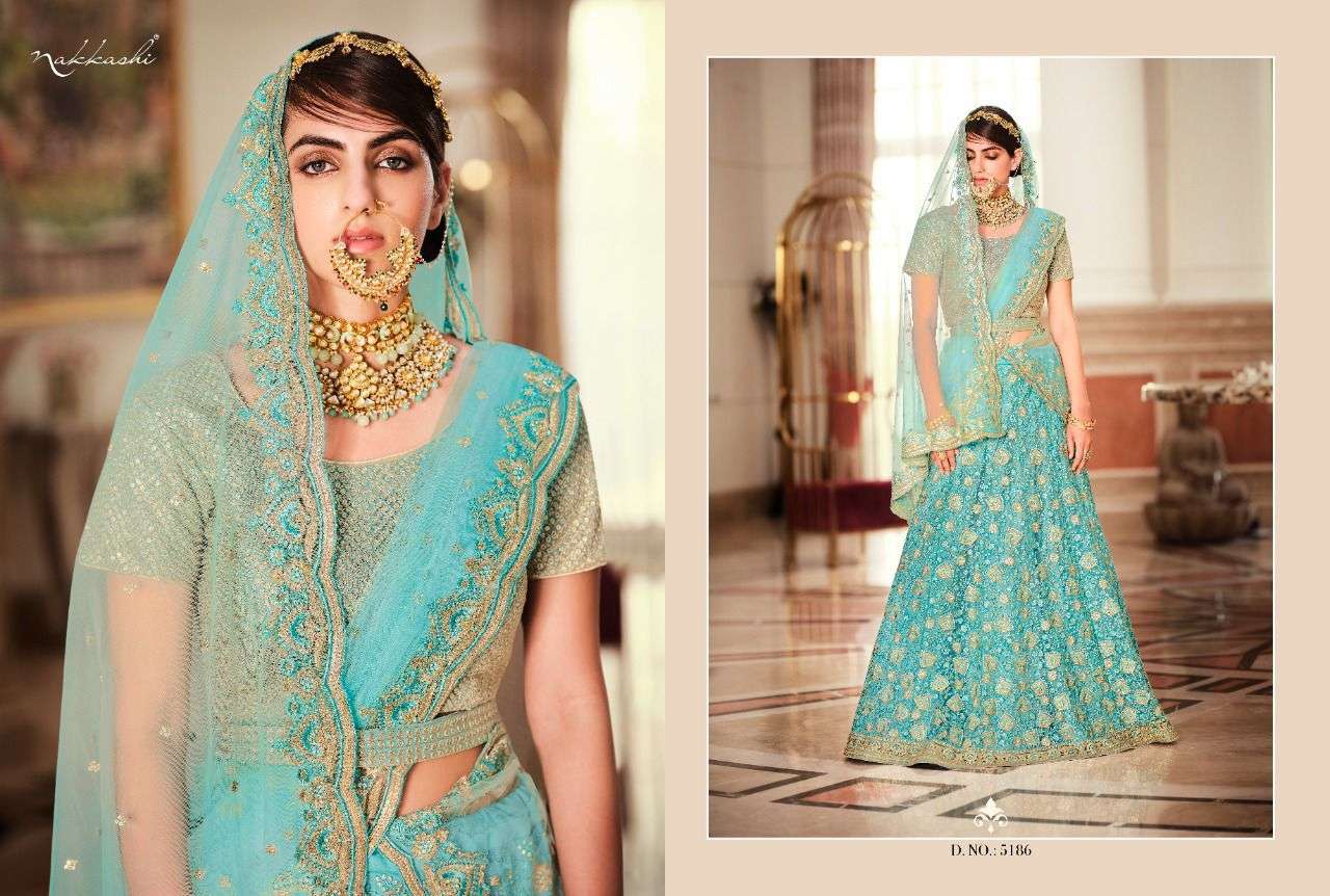 GLAMOUR BY NAKKASHI 5184 TO 5190 SERIES BEAUTIFUL COLORFUL FANCY WEDDING COLLECTION OCCASIONAL WEAR & PARTY WEAR HANDLOOM SILK LEHENGAS AT WHOLESALE PRICE