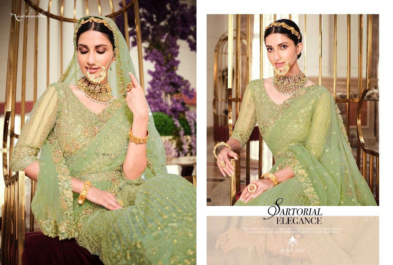 GLAMOUR BY NAKKASHI 5184 TO 5190 SERIES BEAUTIFUL COLORFUL FANCY WEDDING COLLECTION OCCASIONAL WEAR & PARTY WEAR HANDLOOM SILK LEHENGAS AT WHOLESALE PRICE