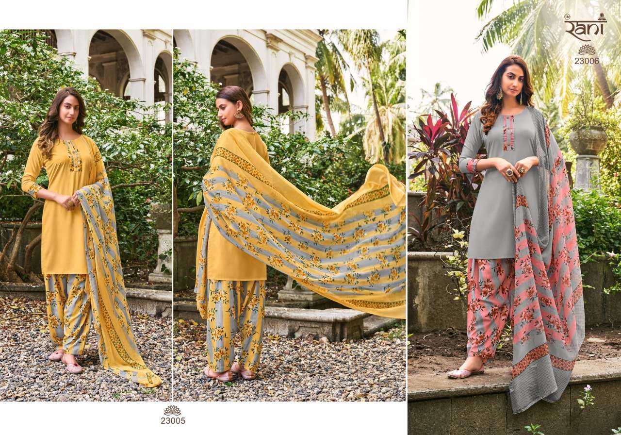 SUNHERI VOL-23 BY RANI FASHION 23001 TO 23016 SERIES BEAUTIFUL STYLISH SUITS FANCY COLORFUL CASUAL WEAR & ETHNIC WEAR & READY TO WEAR HEAVY AMERICAN CREPE PRINTED DRESSES AT WHOLESALE PRICE