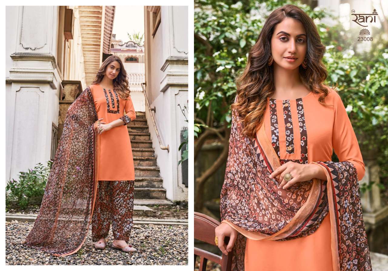 SUNHERI VOL-23 BY RANI FASHION 23001 TO 23016 SERIES BEAUTIFUL STYLISH SUITS FANCY COLORFUL CASUAL WEAR & ETHNIC WEAR & READY TO WEAR HEAVY AMERICAN CREPE PRINTED DRESSES AT WHOLESALE PRICE
