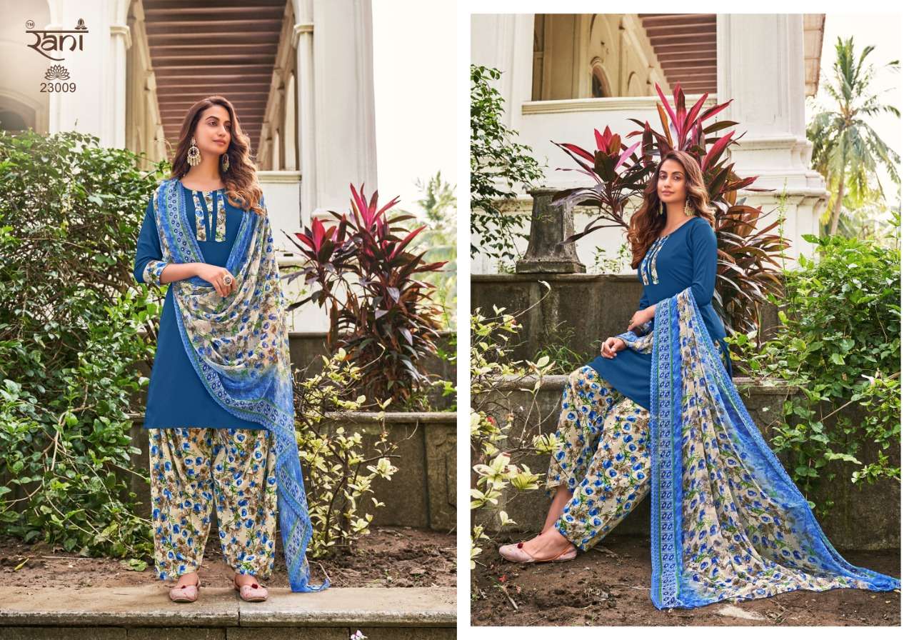 SUNHERI VOL-23 BY RANI FASHION 23001 TO 23016 SERIES BEAUTIFUL STYLISH SUITS FANCY COLORFUL CASUAL WEAR & ETHNIC WEAR & READY TO WEAR HEAVY AMERICAN CREPE PRINTED DRESSES AT WHOLESALE PRICE