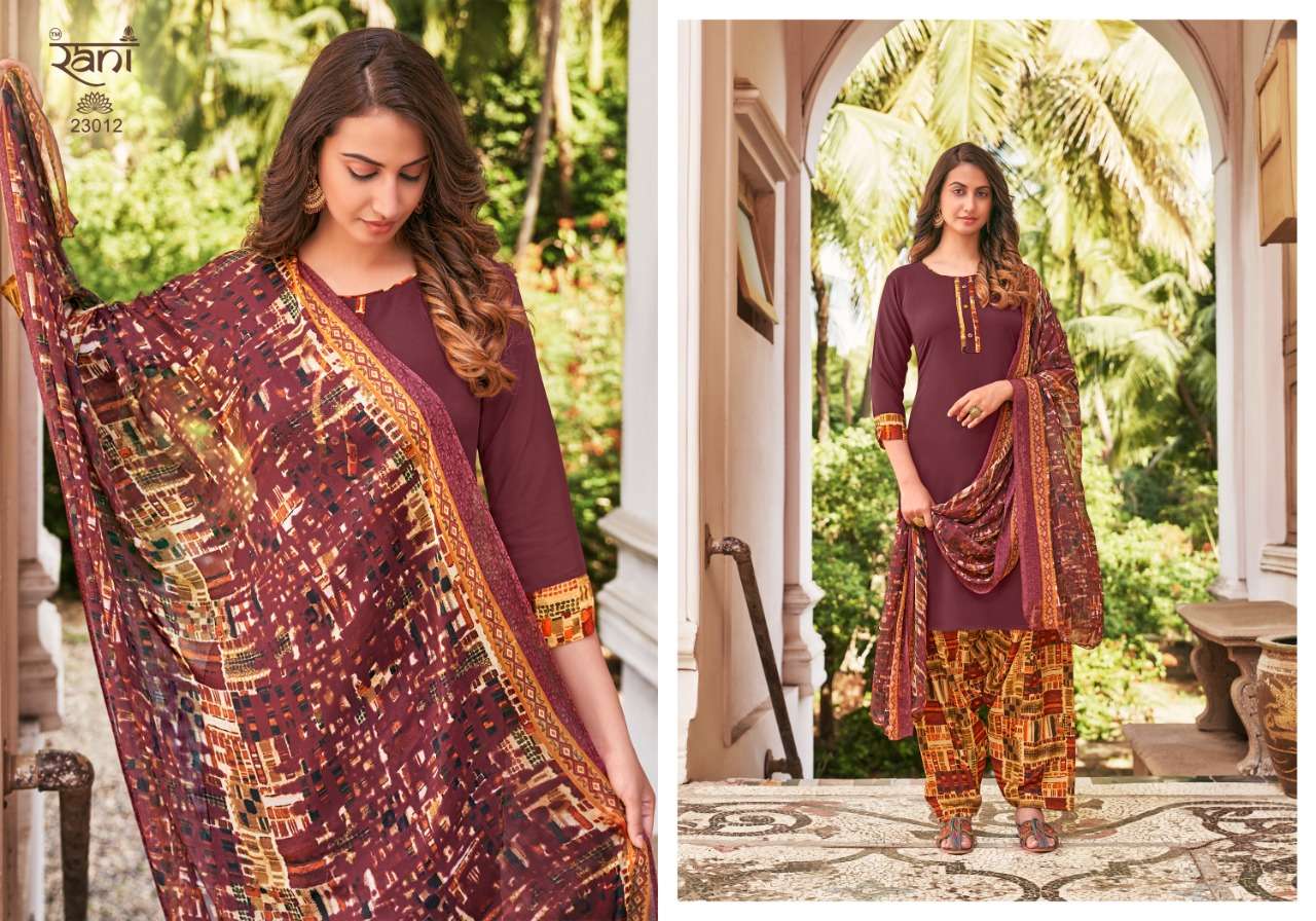 SUNHERI VOL-23 BY RANI FASHION 23001 TO 23016 SERIES BEAUTIFUL STYLISH SUITS FANCY COLORFUL CASUAL WEAR & ETHNIC WEAR & READY TO WEAR HEAVY AMERICAN CREPE PRINTED DRESSES AT WHOLESALE PRICE