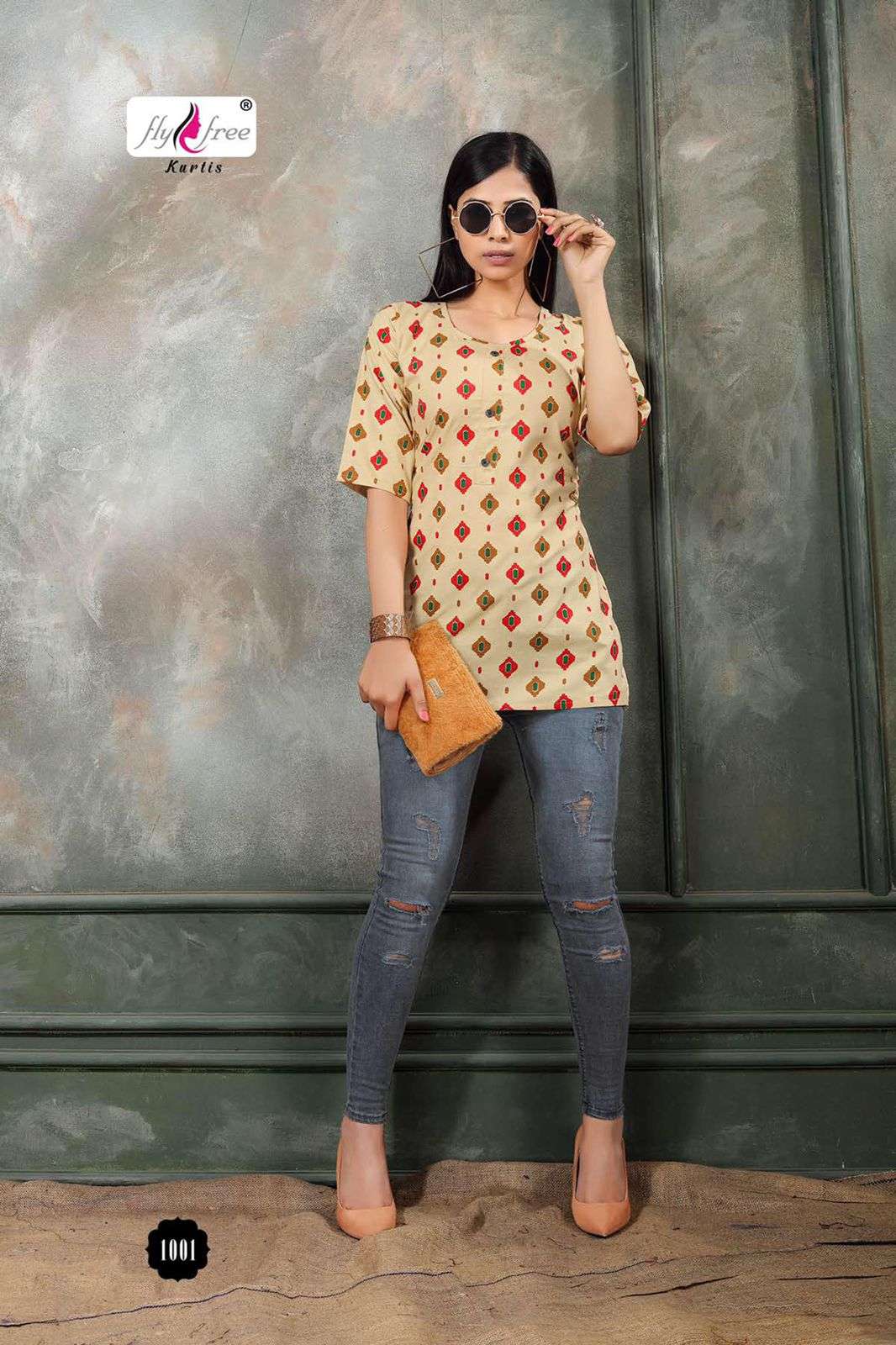 FOLK VOL-8 BY FLY FREE 1001 TO 1014 SERIES BEAUTIFUL STYLISH FANCY COLORFUL CASUAL WEAR & ETHNIC WEAR HEAVY RAYON PRINT TOPS AT WHOLESALE PRICE