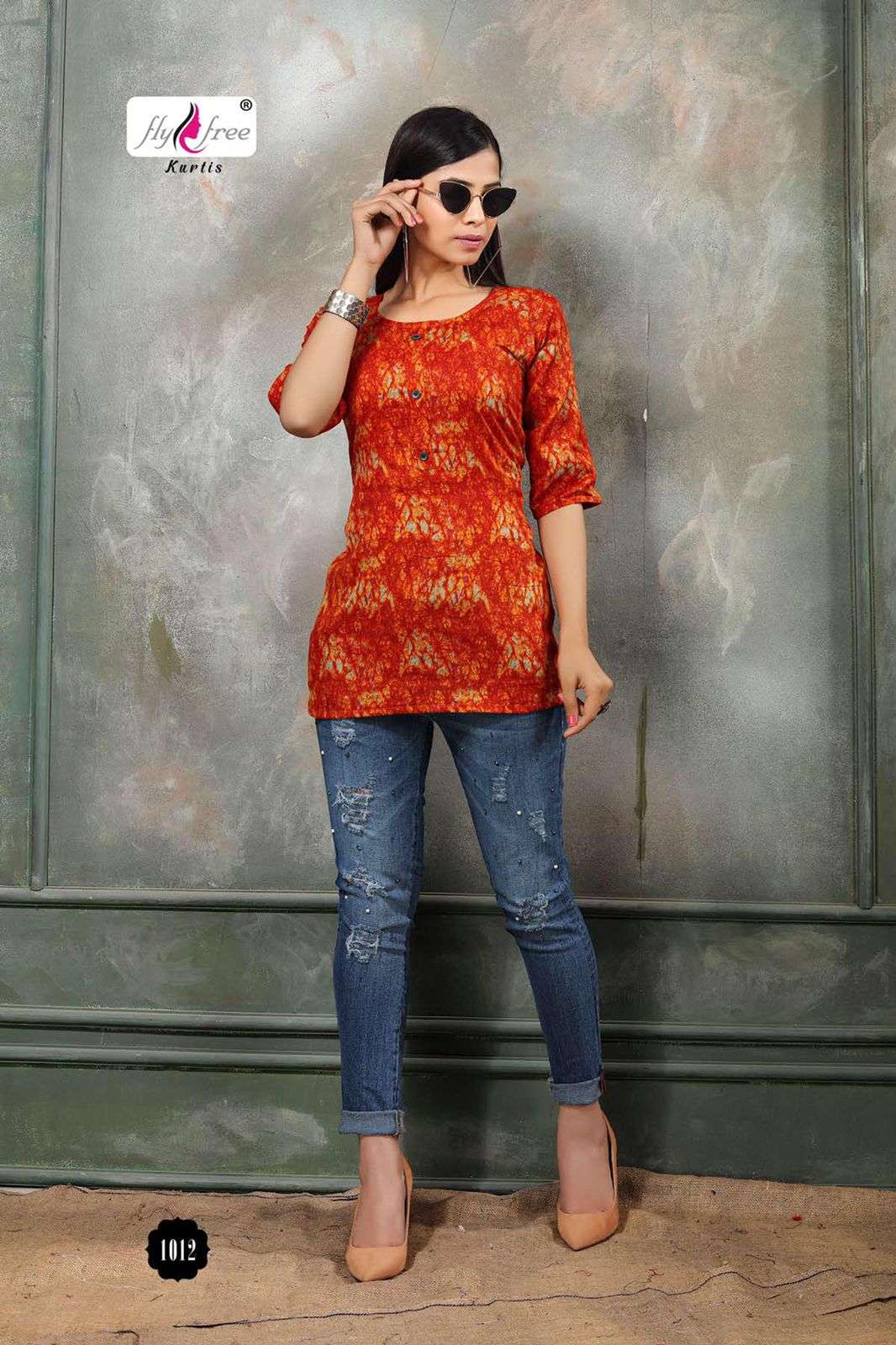 FOLK VOL-8 BY FLY FREE 1001 TO 1014 SERIES BEAUTIFUL STYLISH FANCY COLORFUL CASUAL WEAR & ETHNIC WEAR HEAVY RAYON PRINT TOPS AT WHOLESALE PRICE