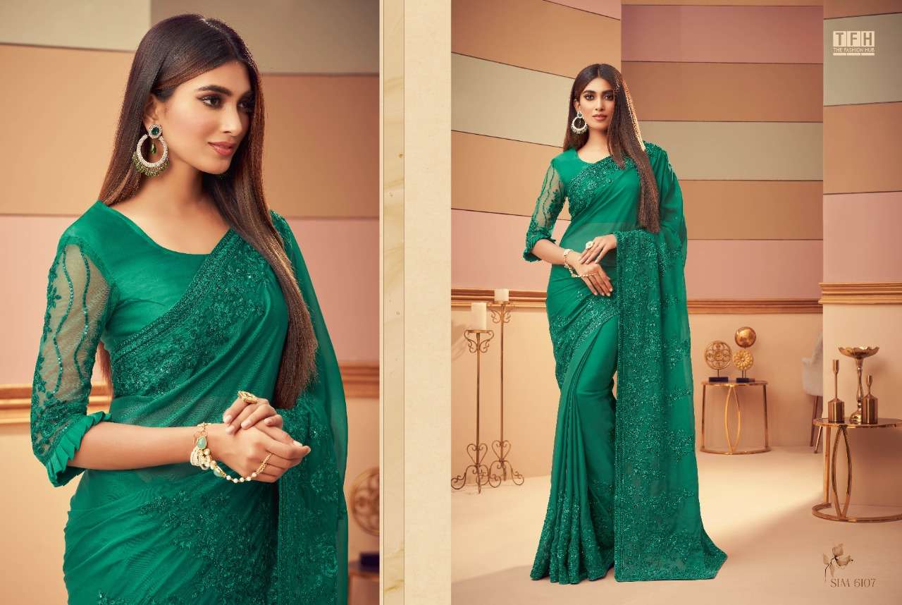 SIMRAN STORY BY TFH INDIAN TRADITIONAL WEAR COLLECTION BEAUTIFUL STYLISH FANCY COLORFUL PARTY WEAR & OCCASIONAL WEAR FANCY SAREES AT WHOLESALE PRICE