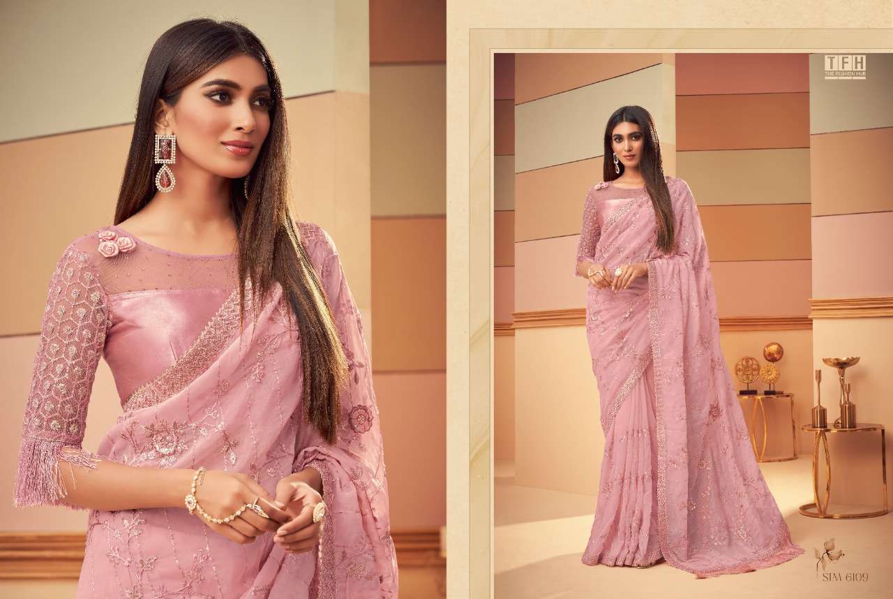 SIMRAN STORY BY TFH INDIAN TRADITIONAL WEAR COLLECTION BEAUTIFUL STYLISH FANCY COLORFUL PARTY WEAR & OCCASIONAL WEAR FANCY SAREES AT WHOLESALE PRICE