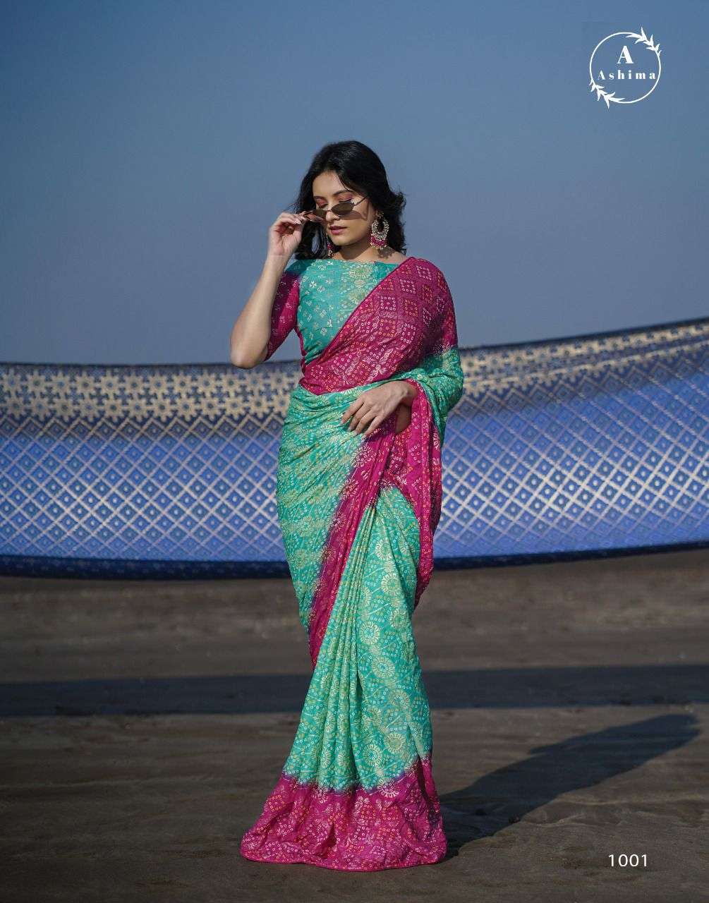 BANDHANI FOILY BY ASHIMA 1001 TO 1008 SERIES INDIAN TRADITIONAL WEAR COLLECTION BEAUTIFUL STYLISH FANCY COLORFUL PARTY WEAR & OCCASIONAL WEAR MOSS FOIL SAREES AT WHOLESALE PRICE