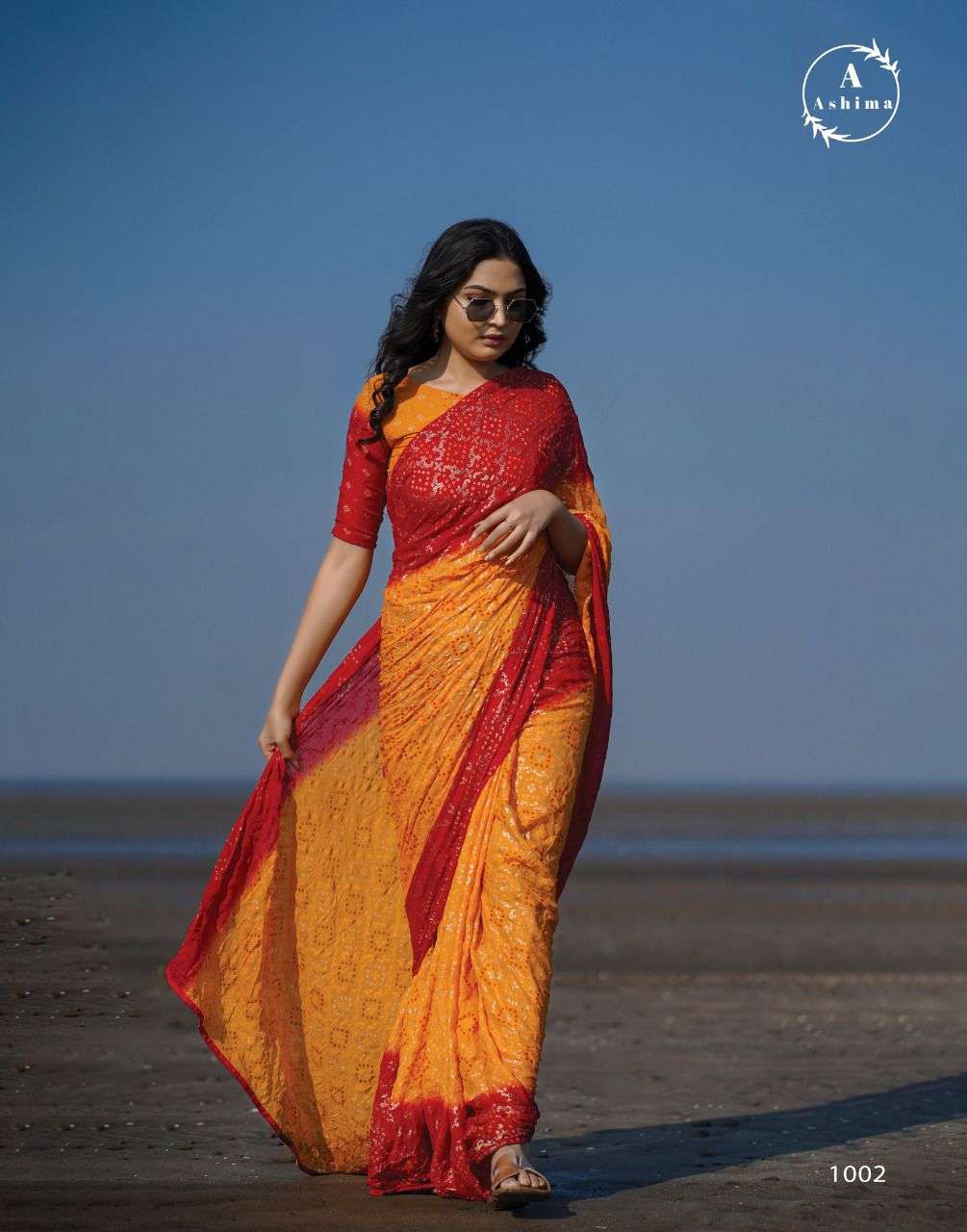 BANDHANI FOILY BY ASHIMA 1001 TO 1008 SERIES INDIAN TRADITIONAL WEAR COLLECTION BEAUTIFUL STYLISH FANCY COLORFUL PARTY WEAR & OCCASIONAL WEAR MOSS FOIL SAREES AT WHOLESALE PRICE