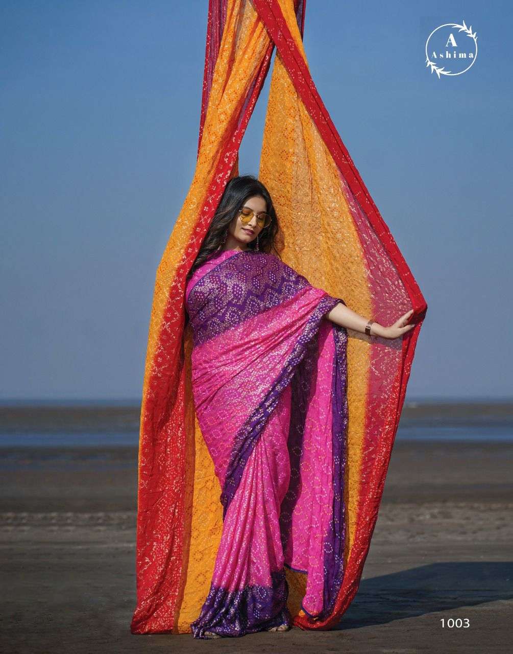 BANDHANI FOILY BY ASHIMA 1001 TO 1008 SERIES INDIAN TRADITIONAL WEAR COLLECTION BEAUTIFUL STYLISH FANCY COLORFUL PARTY WEAR & OCCASIONAL WEAR MOSS FOIL SAREES AT WHOLESALE PRICE