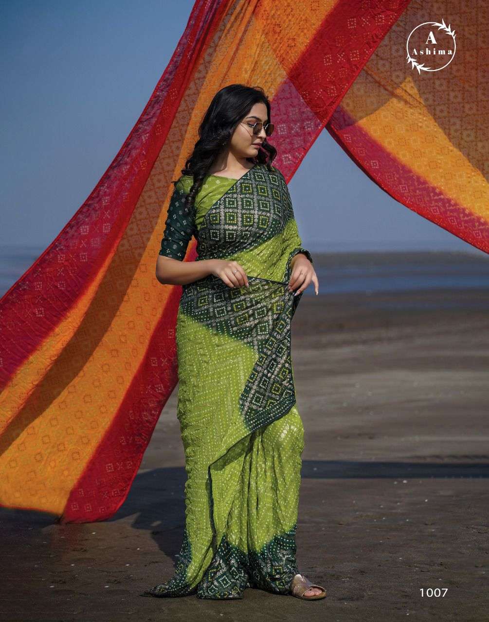 BANDHANI FOILY BY ASHIMA 1001 TO 1008 SERIES INDIAN TRADITIONAL WEAR COLLECTION BEAUTIFUL STYLISH FANCY COLORFUL PARTY WEAR & OCCASIONAL WEAR MOSS FOIL SAREES AT WHOLESALE PRICE