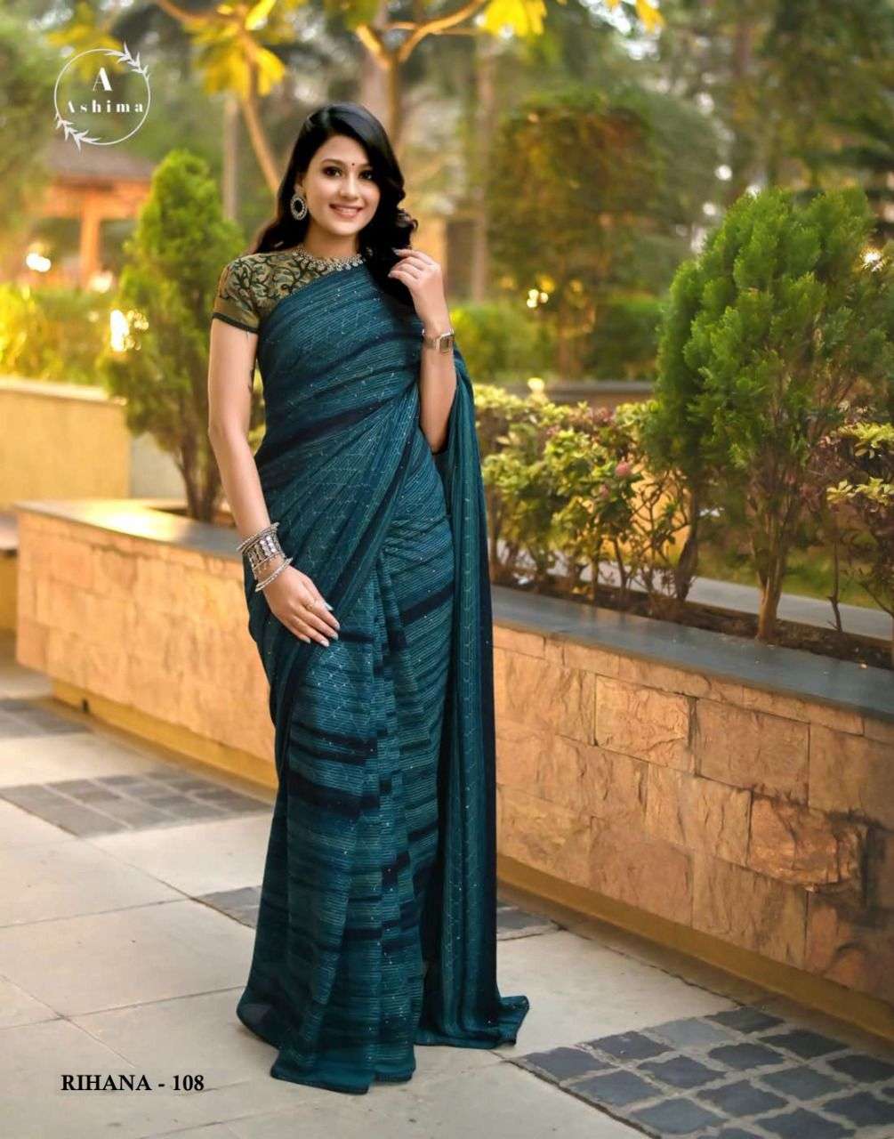 RIHANA PRISM BY ASHIMA 101 TO 108 SERIES INDIAN TRADITIONAL WEAR COLLECTION BEAUTIFUL STYLISH FANCY COLORFUL PARTY WEAR & OCCASIONAL WEAR GEORGETTE EMBROIDERED SAREES AT WHOLESALE PRICE