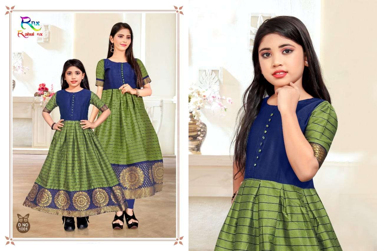 KIDSWEAR BY RAHUL NX 1001 TO 1006 SERIES BEAUTIFUL BEAUTIFUL STYLISH FANCY COLORFUL CASUAL WEAR & ETHNIC WEAR READY TO WEAR BANARASI SILK JACQUARD GOWNS AT WHOLESALE PRICE
