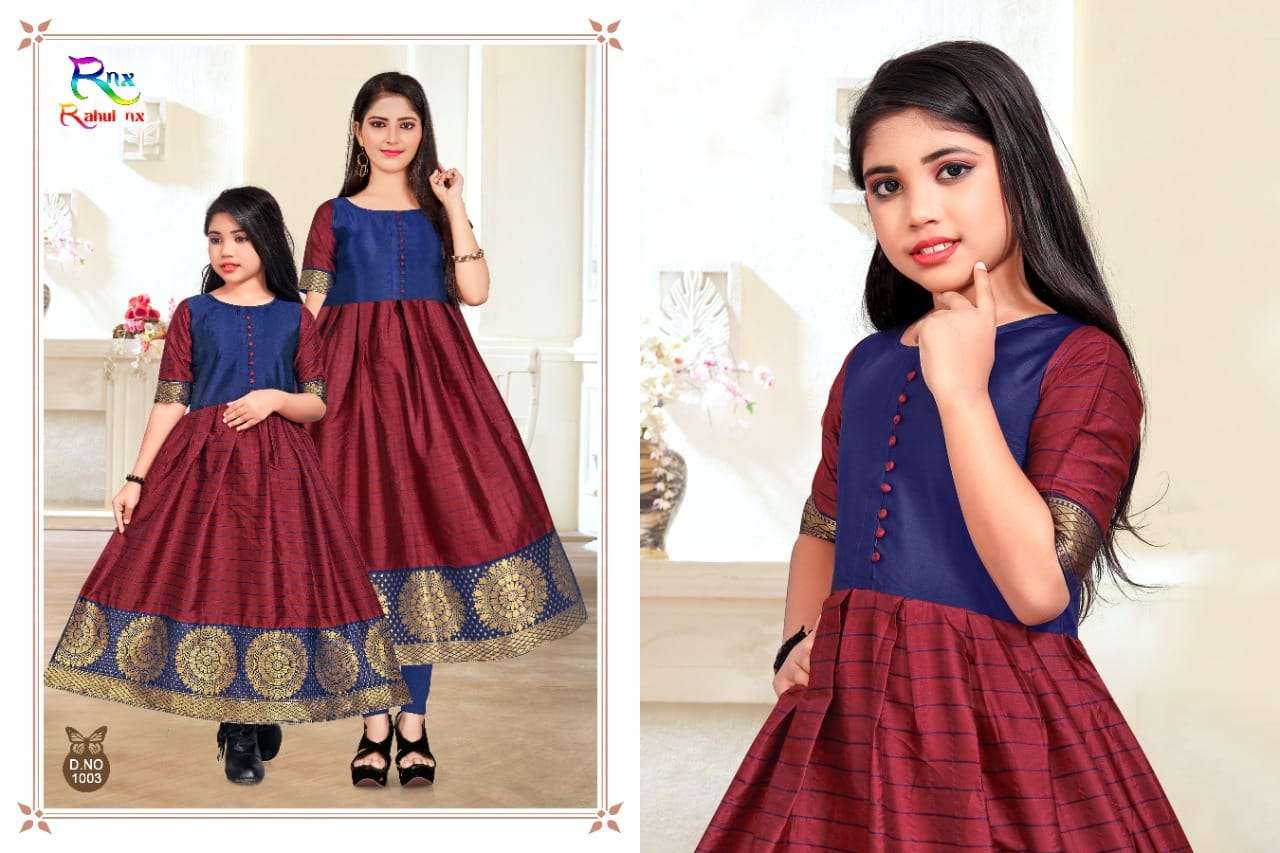 KIDSWEAR BY RAHUL NX 1001 TO 1006 SERIES BEAUTIFUL BEAUTIFUL STYLISH FANCY COLORFUL CASUAL WEAR & ETHNIC WEAR READY TO WEAR BANARASI SILK JACQUARD GOWNS AT WHOLESALE PRICE