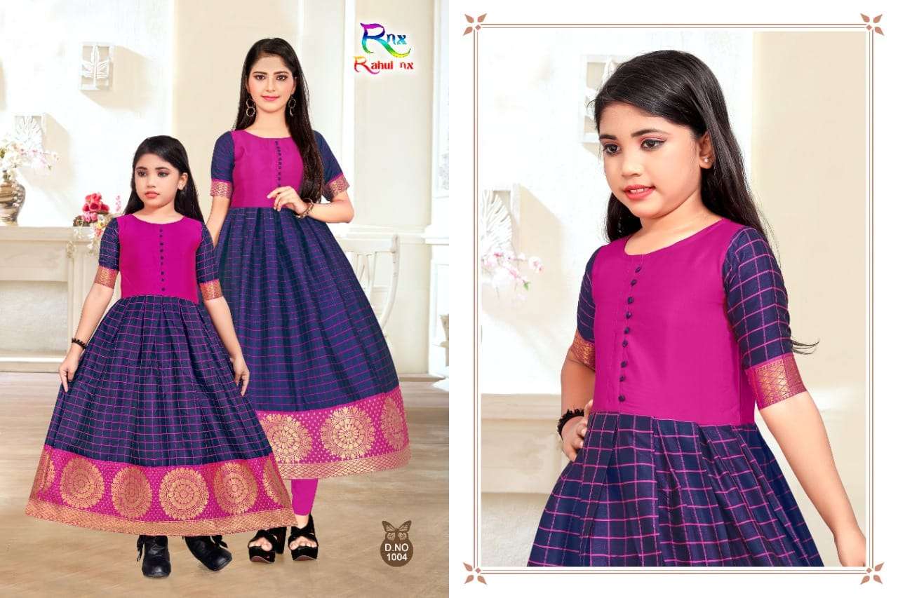 KIDSWEAR BY RAHUL NX 1001 TO 1006 SERIES BEAUTIFUL BEAUTIFUL STYLISH FANCY COLORFUL CASUAL WEAR & ETHNIC WEAR READY TO WEAR BANARASI SILK JACQUARD GOWNS AT WHOLESALE PRICE