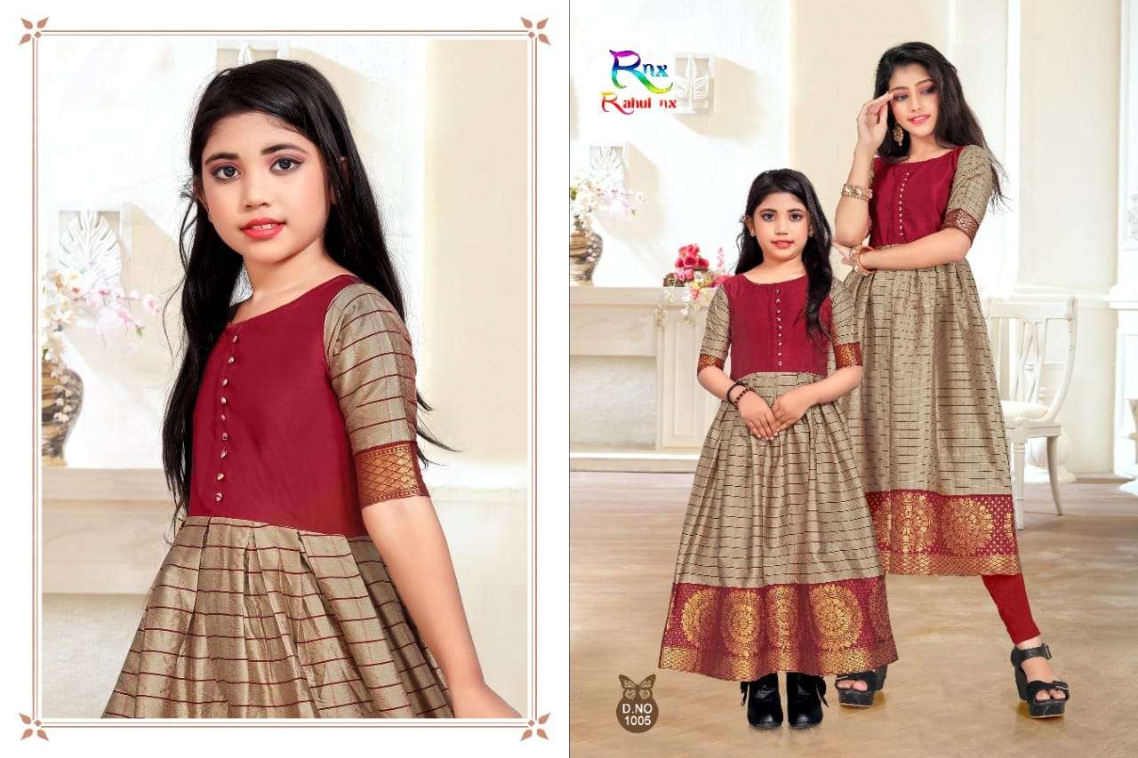 KIDSWEAR BY RAHUL NX 1001 TO 1006 SERIES BEAUTIFUL BEAUTIFUL STYLISH FANCY COLORFUL CASUAL WEAR & ETHNIC WEAR READY TO WEAR BANARASI SILK JACQUARD GOWNS AT WHOLESALE PRICE