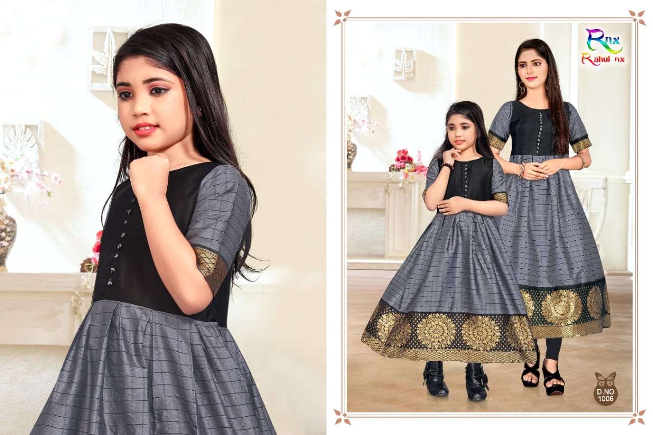 KIDSWEAR BY RAHUL NX 1001 TO 1006 SERIES BEAUTIFUL BEAUTIFUL STYLISH FANCY COLORFUL CASUAL WEAR & ETHNIC WEAR READY TO WEAR BANARASI SILK JACQUARD GOWNS AT WHOLESALE PRICE