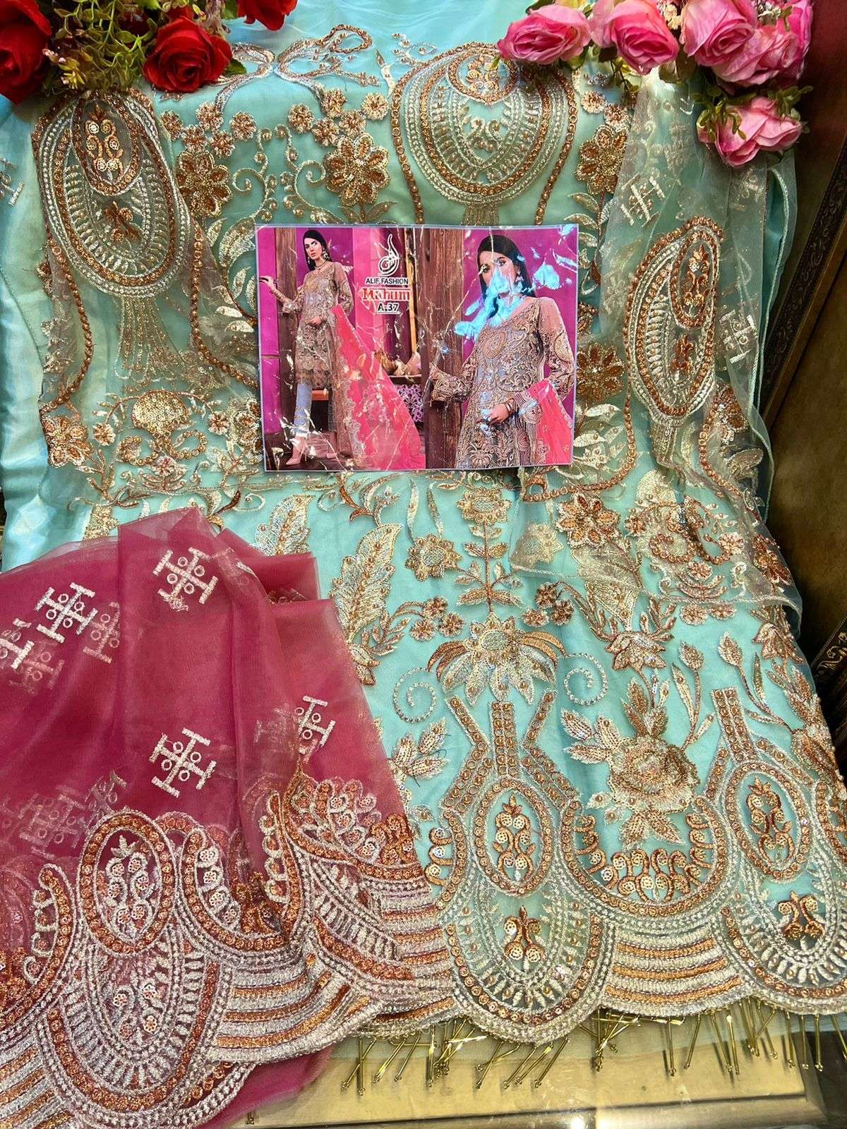 MAHUM BY ALIF FASHION DESIGNER PAKISTANI SUITS BEAUTIFUL STYLISH FANCY COLORFUL PARTY WEAR & OCCASIONAL WEAR HEAVY BUTTERFLY NET DRESSES AT WHOLESALE PRICE