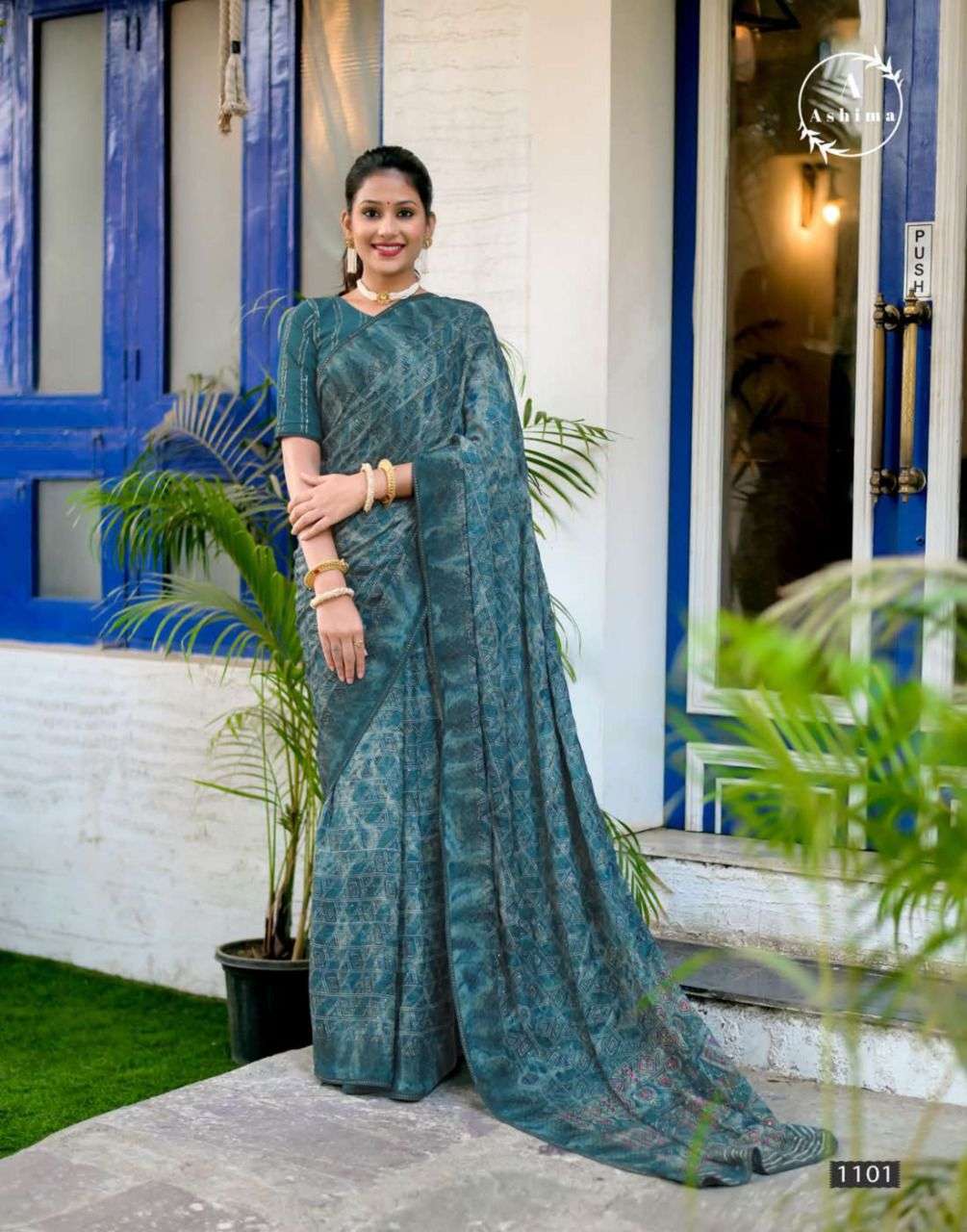 AJRAKH PRISM BY ASHIMA 1101 TO 1108 SERIES INDIAN TRADITIONAL WEAR COLLECTION BEAUTIFUL STYLISH FANCY COLORFUL PARTY WEAR & OCCASIONAL WEAR GEORGETTE PRINT SAREES AT WHOLESALE PRICE