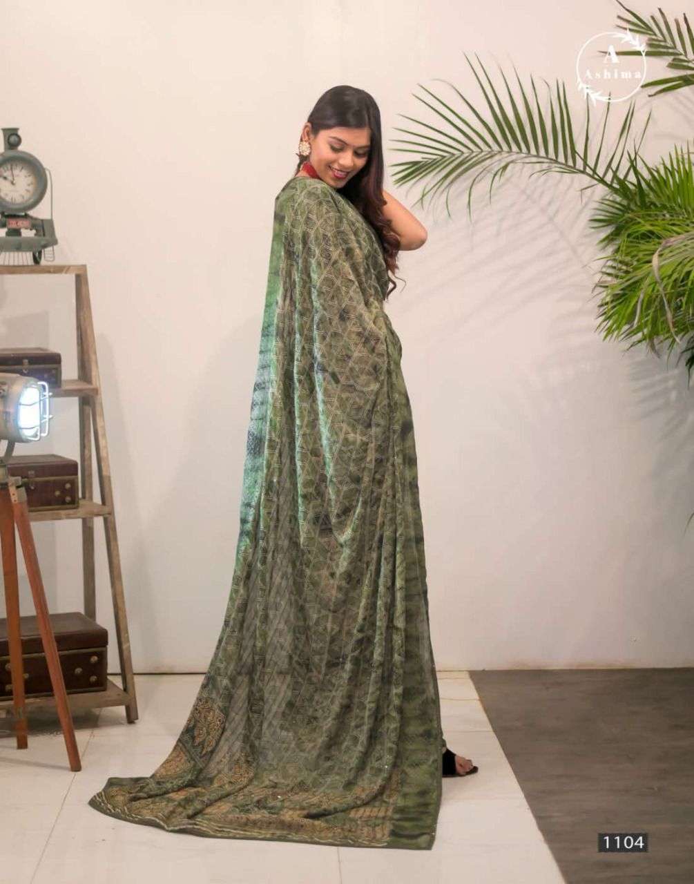 AJRAKH PRISM BY ASHIMA 1101 TO 1108 SERIES INDIAN TRADITIONAL WEAR COLLECTION BEAUTIFUL STYLISH FANCY COLORFUL PARTY WEAR & OCCASIONAL WEAR GEORGETTE PRINT SAREES AT WHOLESALE PRICE