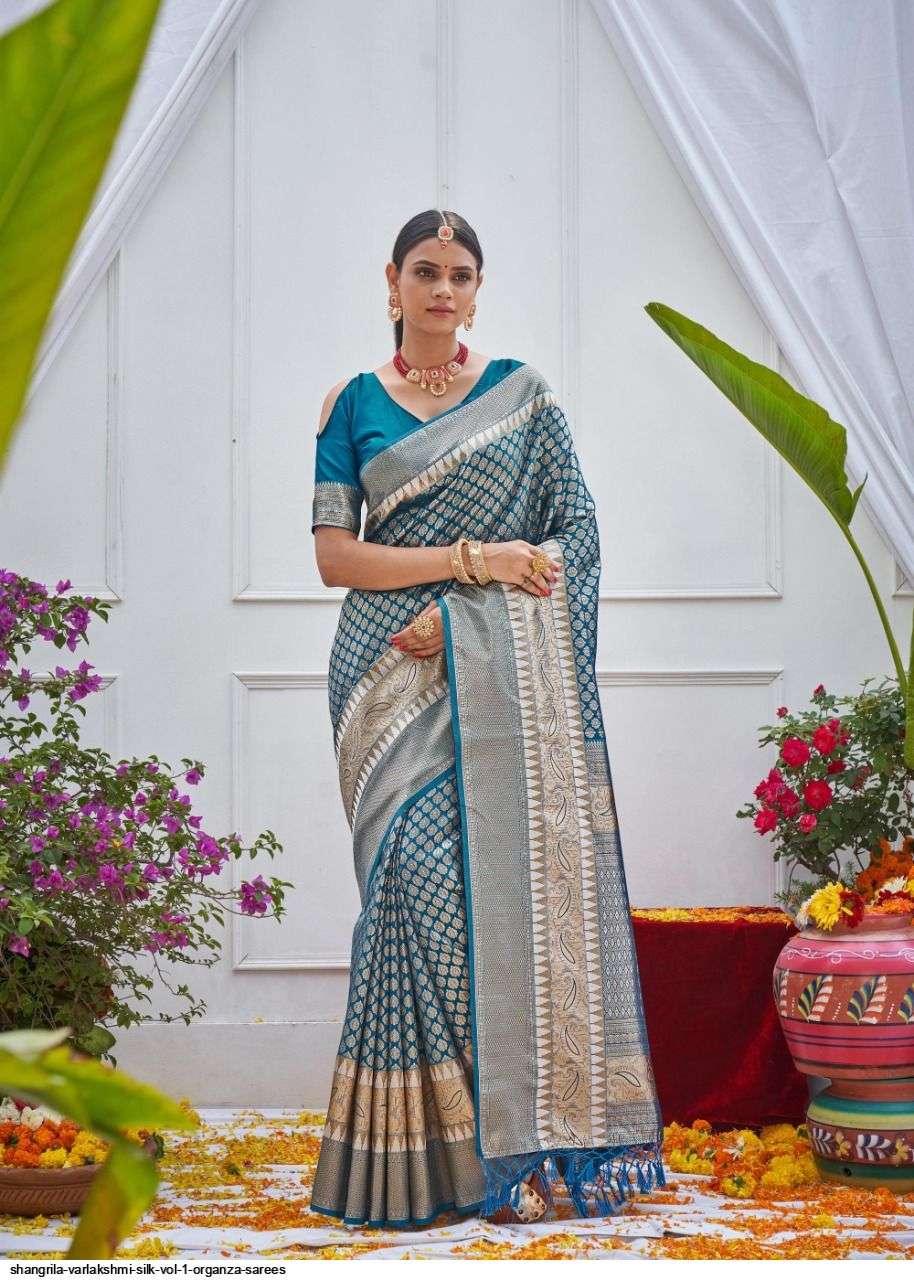 VARLAKSHMI SILK BY SHANGRILA A TO F SERIES INDIAN TRADITIONAL WEAR COLLECTION BEAUTIFUL STYLISH FANCY COLORFUL PARTY WEAR & OCCASIONAL WEAR SOFT ORGANZA SAREES AT WHOLESALE PRICE