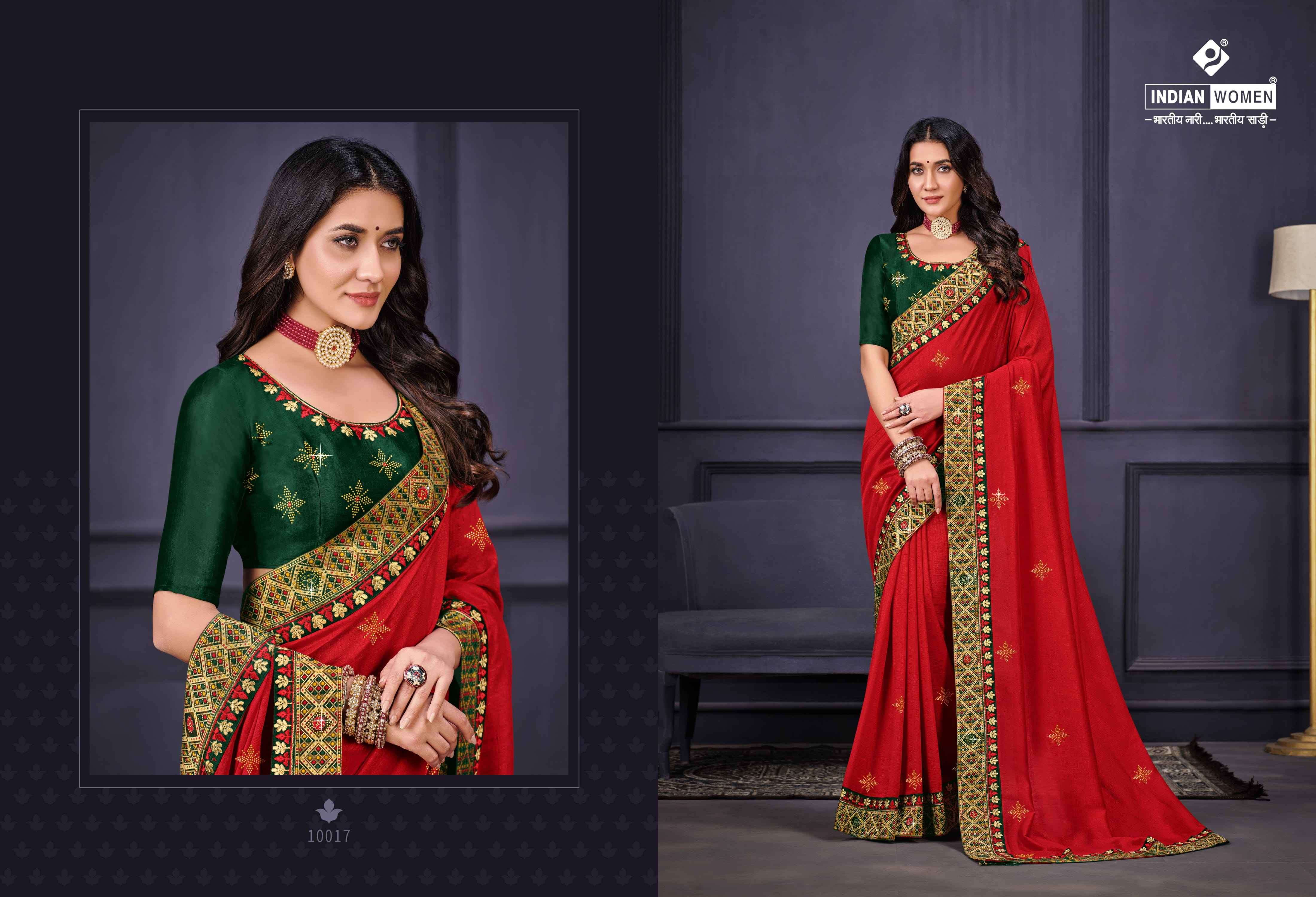 NEW ORANGE BY INDIAN WOMEN 10017 TO 10022 SERIES INDIAN TRADITIONAL WEAR COLLECTION BEAUTIFUL STYLISH FANCY COLORFUL PARTY WEAR & OCCASIONAL WEAR FANCY SAREES AT WHOLESALE PRICE