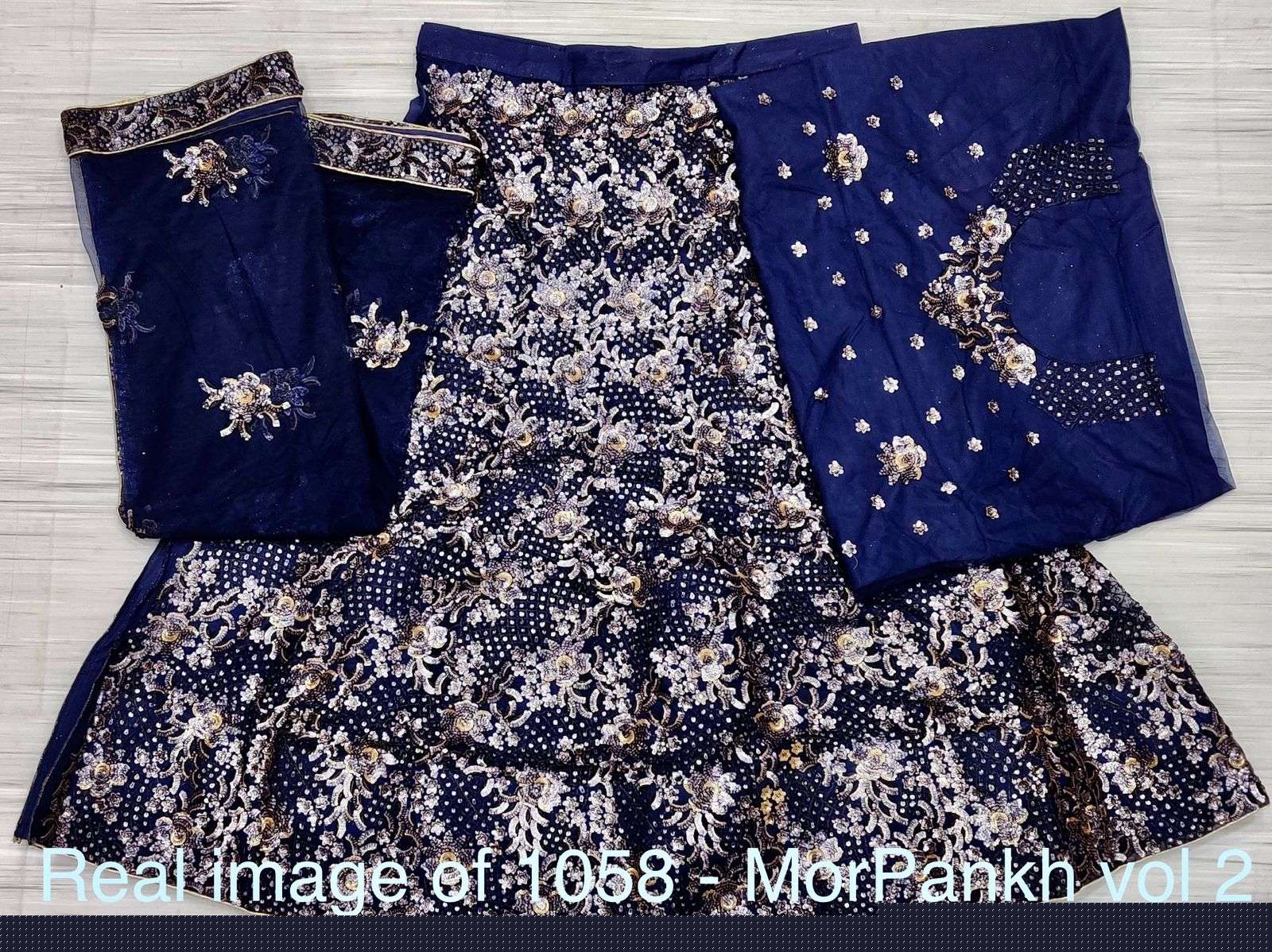 MOR PANKH VOL-2 BY ANJANI ART 1057 TO 1060 SERIES DESIGNER BEAUTIFUL NAVRATRI COLLECTION OCCASIONAL WEAR & PARTY WEAR BRIDAL NET LEHENGAS AT WHOLESALE PRICE