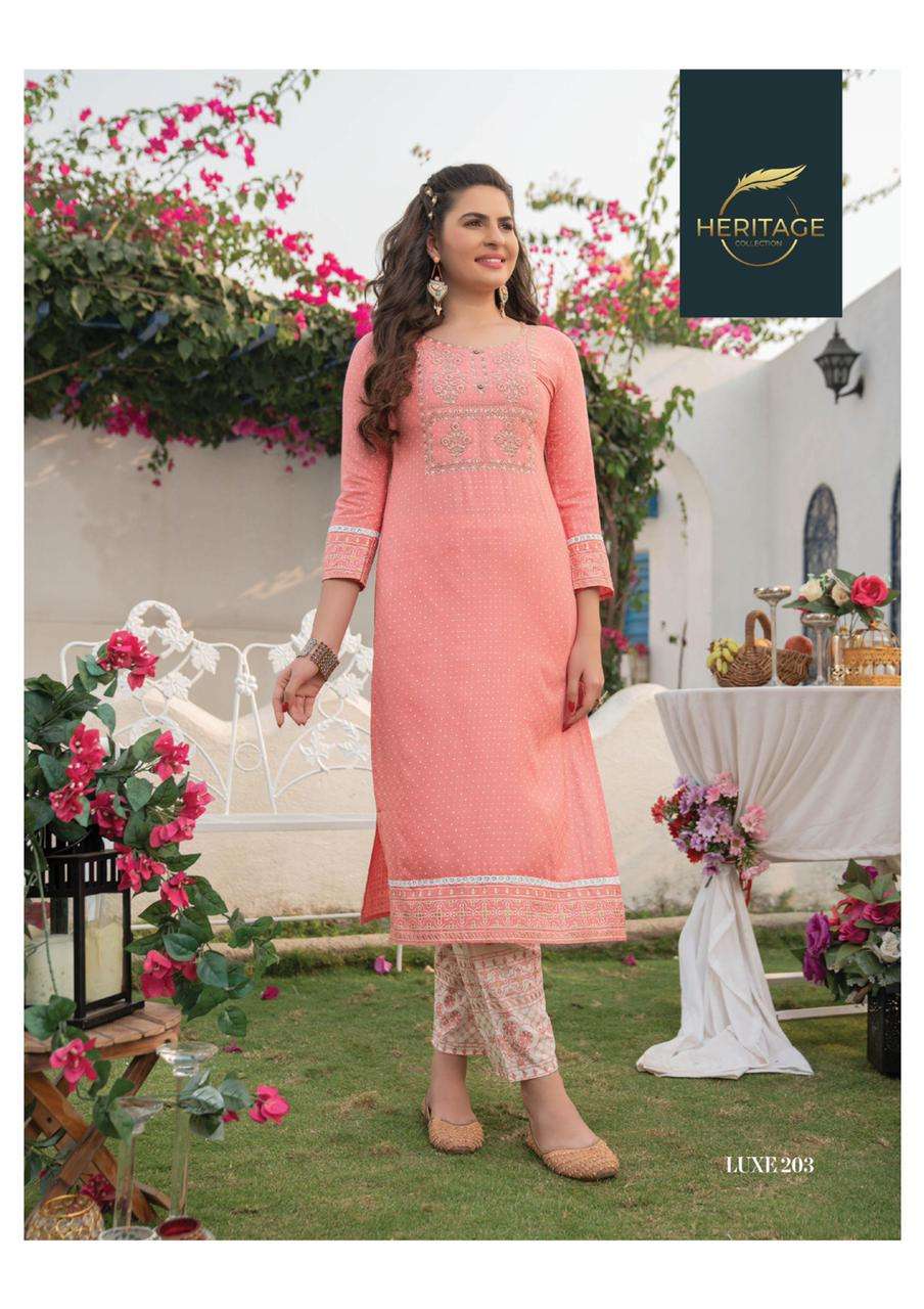 LUXE VOl-2 BY HERITAGE 201 TO 206 SERIES DESIGNER STYLISH FANCY COLORFUL BEAUTIFUL PARTY WEAR & ETHNIC WEAR COLLECTION RAYON KURTIS WITH BOTTOM AT WHOLESALE PRICE