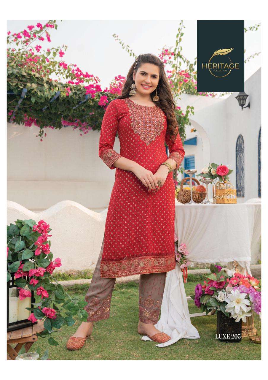 LUXE VOl-2 BY HERITAGE 201 TO 206 SERIES DESIGNER STYLISH FANCY COLORFUL BEAUTIFUL PARTY WEAR & ETHNIC WEAR COLLECTION RAYON KURTIS WITH BOTTOM AT WHOLESALE PRICE