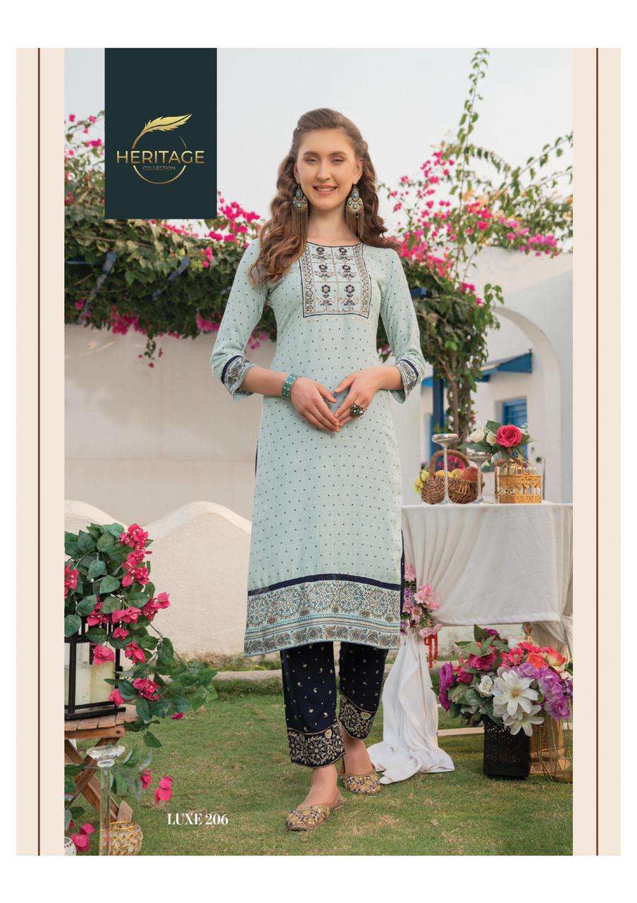 LUXE VOl-2 BY HERITAGE 201 TO 206 SERIES DESIGNER STYLISH FANCY COLORFUL BEAUTIFUL PARTY WEAR & ETHNIC WEAR COLLECTION RAYON KURTIS WITH BOTTOM AT WHOLESALE PRICE