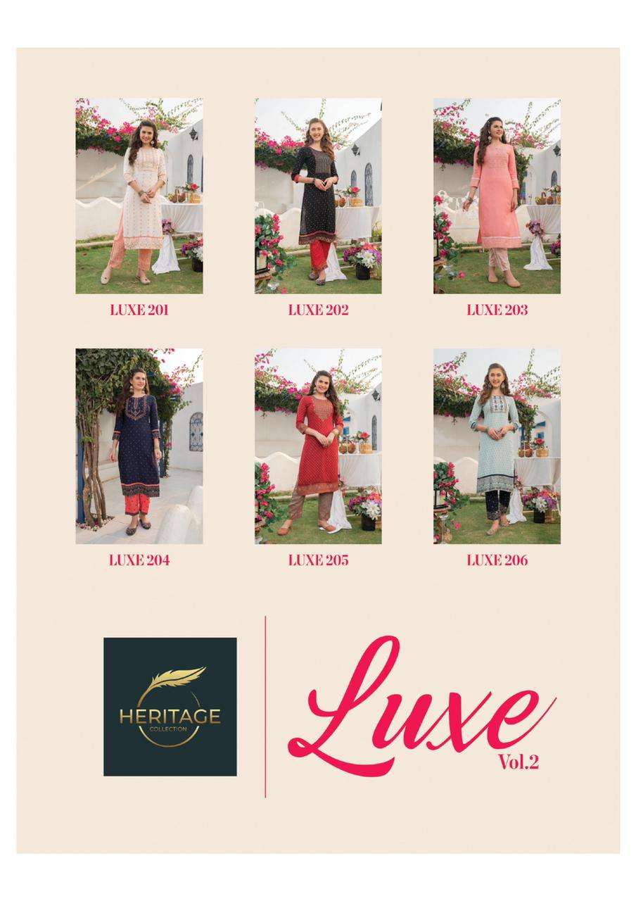 LUXE VOl-2 BY HERITAGE 201 TO 206 SERIES DESIGNER STYLISH FANCY COLORFUL BEAUTIFUL PARTY WEAR & ETHNIC WEAR COLLECTION RAYON KURTIS WITH BOTTOM AT WHOLESALE PRICE