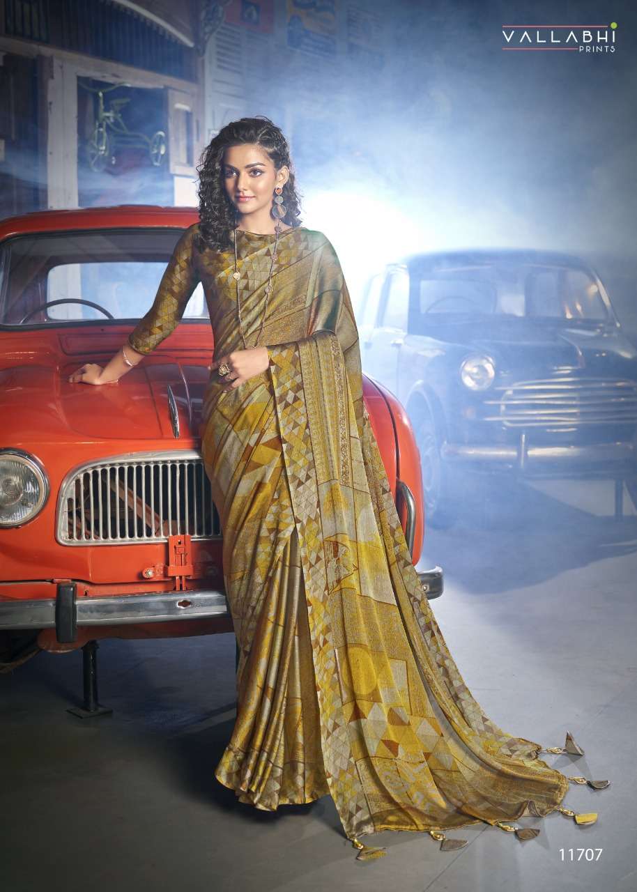 BLOOMING BY VALLABHI PRINTS 11701 TO 11708 SERIES INDIAN TRADITIONAL WEAR COLLECTION BEAUTIFUL STYLISH FANCY COLORFUL PARTY WEAR & OCCASIONAL WEAR MOSS CHIFFON SAREES AT WHOLESALE PRICE