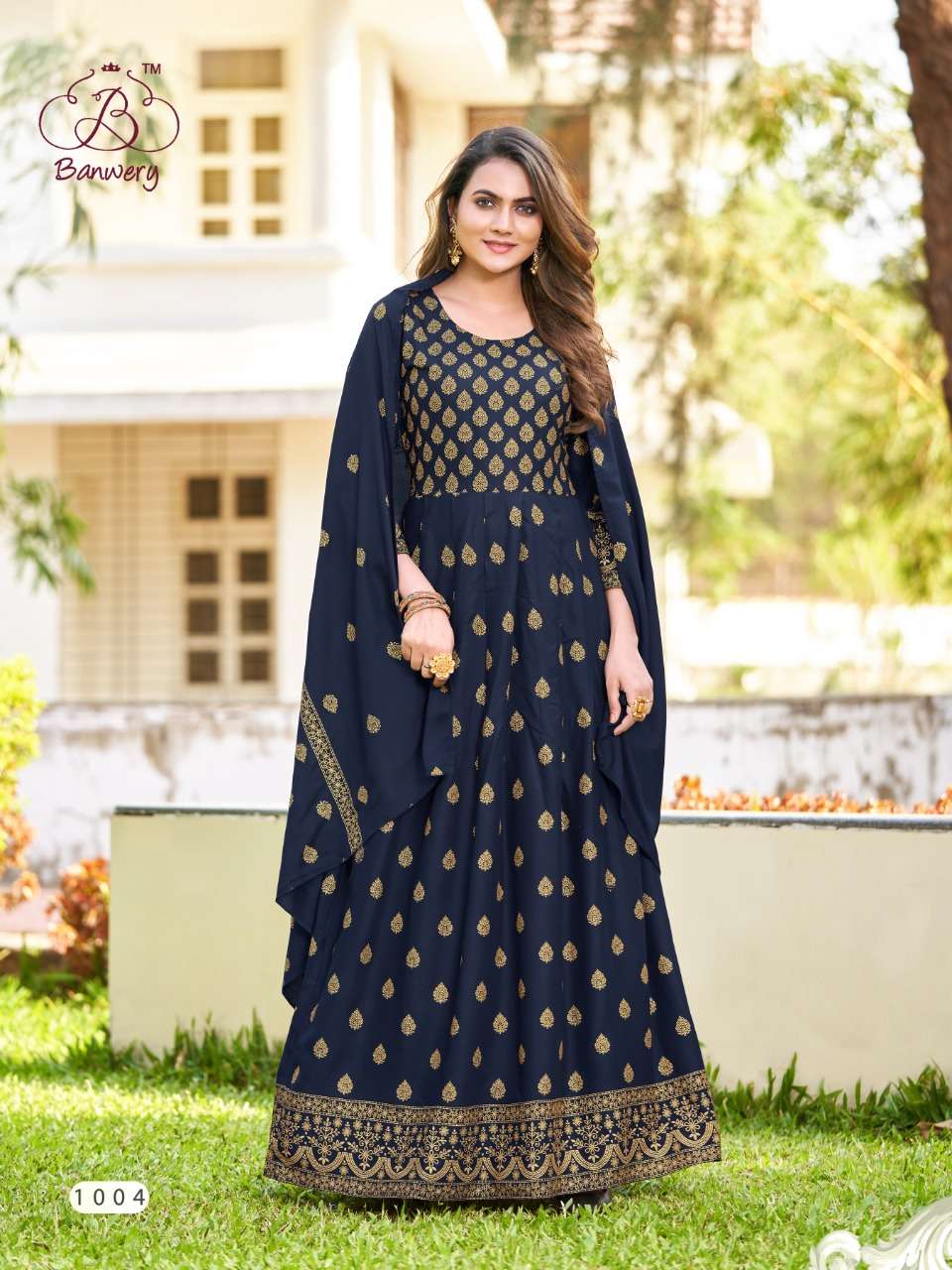 PARIDHI BY BANWERY FASHION 1001 TO 1008 SERIES BEAUTIFUL STYLISH FANCY COLORFUL CASUAL WEAR & ETHNIC WEAR RAYON PRINT GOWNS WITH DUPATTA AT WHOLESALE PRICE