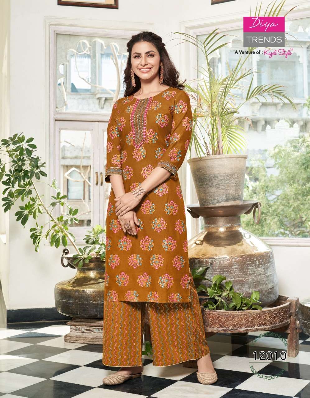 BIBA VOL-12 BY DIYA TRENDS 12001 TO 12014 SERIES BEAUTIFUL COLORFUL STYLISH FANCY CASUAL WEAR & ETHNIC WEAR & READY TO WEAR RAYON PRINT KURTIS WITH BOTTOM AT WHOLESALE PRICE