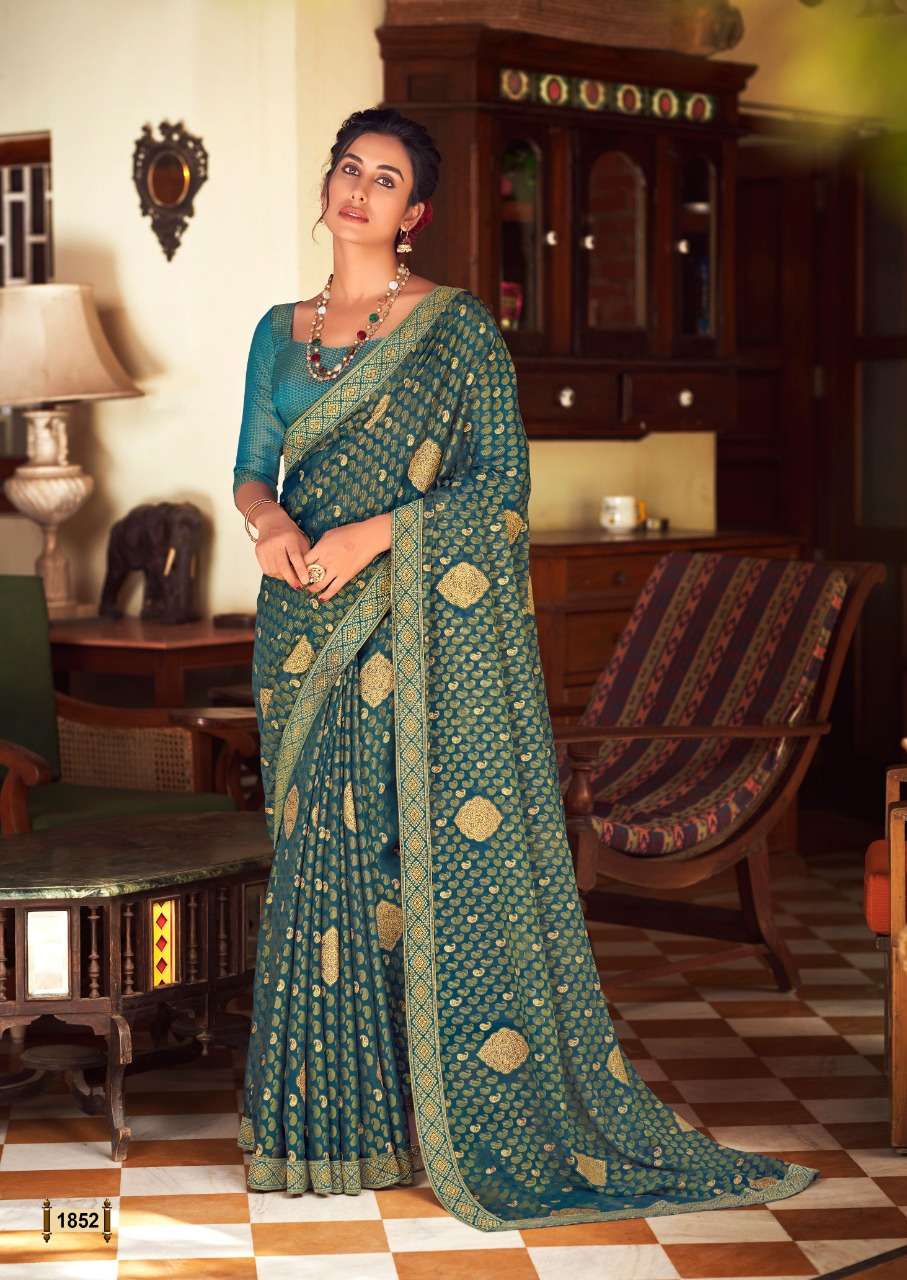 RAVINA BY KASHVI CREATION 1851 TO 1860 SERIES INDIAN TRADITIONAL WEAR COLLECTION BEAUTIFUL STYLISH FANCY COLORFUL PARTY WEAR & OCCASIONAL WEAR CHIFFON BRASSO SAREES AT WHOLESALE PRICE