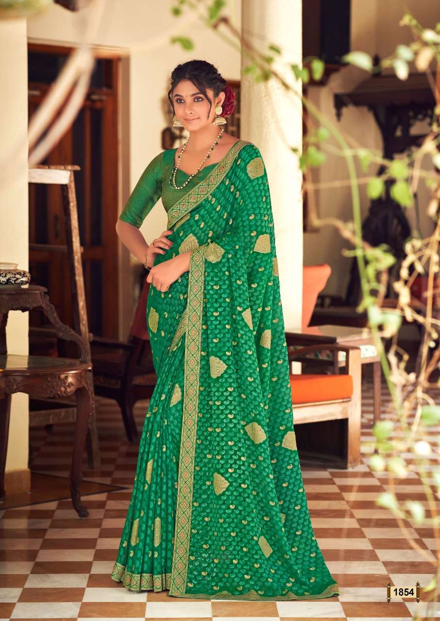 RAVINA BY KASHVI CREATION 1851 TO 1860 SERIES INDIAN TRADITIONAL WEAR COLLECTION BEAUTIFUL STYLISH FANCY COLORFUL PARTY WEAR & OCCASIONAL WEAR CHIFFON BRASSO SAREES AT WHOLESALE PRICE