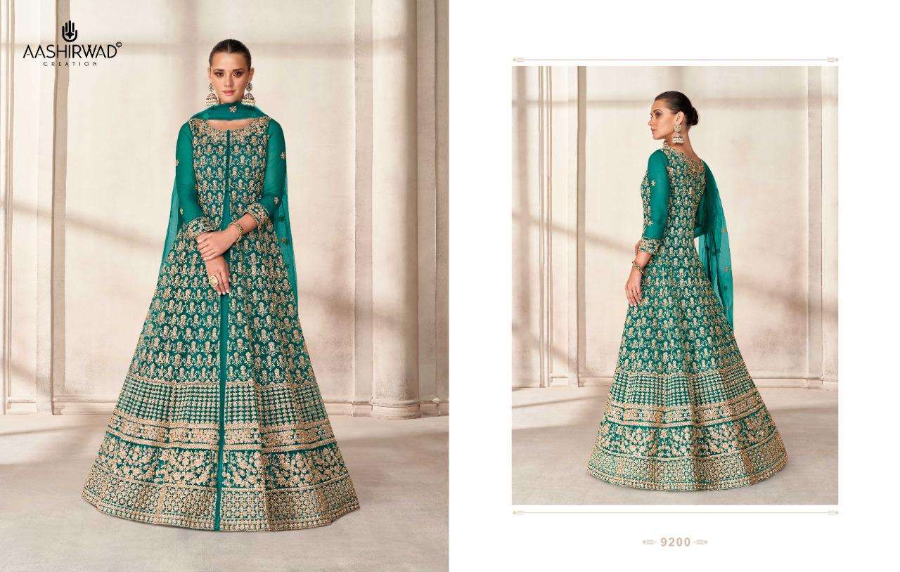PRISHA BY AASHIRWAD CREATION 9199 TO 9203 SERIES BEAUTIFUL ANARKALI SUITS COLORFUL STYLISH FANCY CASUAL WEAR & ETHNIC WEAR BUTTERFLY NET DRESSES AT WHOLESALE PRICE