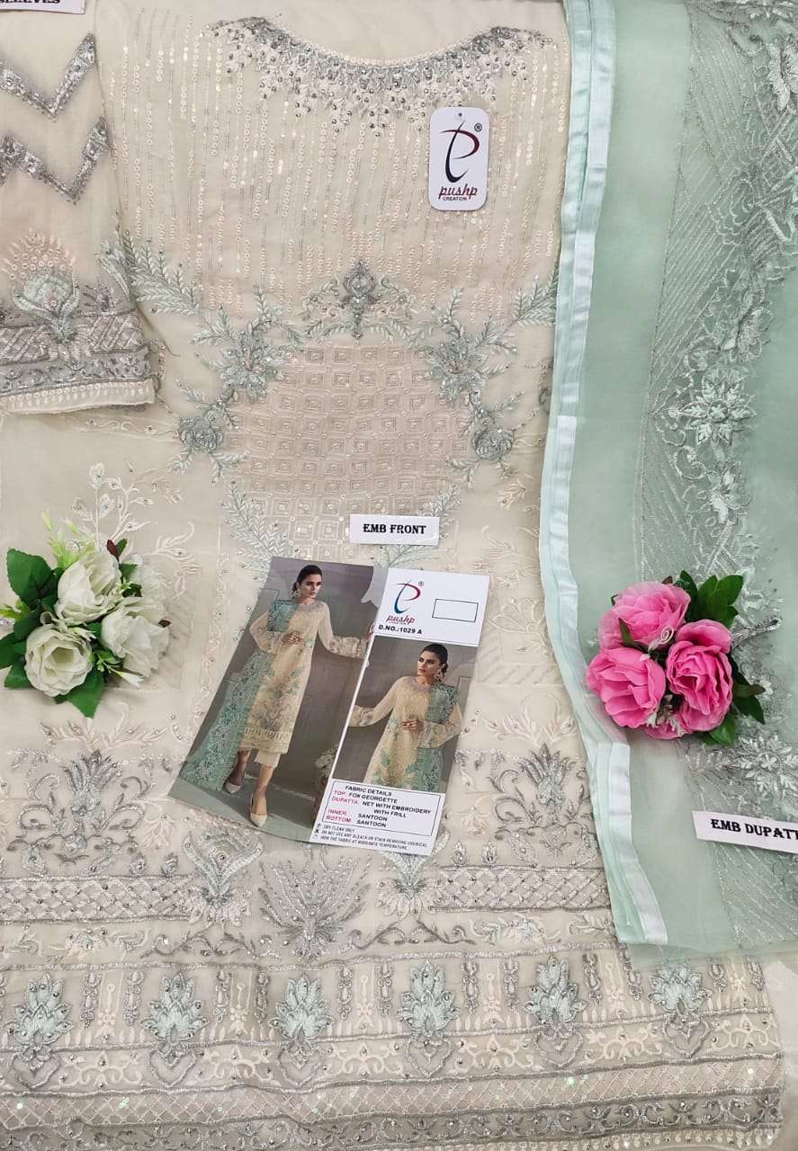 PUSHP HIT DESIGN 1029 COLOURS BY PUSHP CREATION 1029-A TO 1029-D SERIES DESIGNER PAKISTANI SUITS BEAUTIFUL STYLISH FANCY COLORFUL PARTY WEAR & OCCASIONAL WEAR NET EMBROIDERED DRESSES AT WHOLESALE PRICE