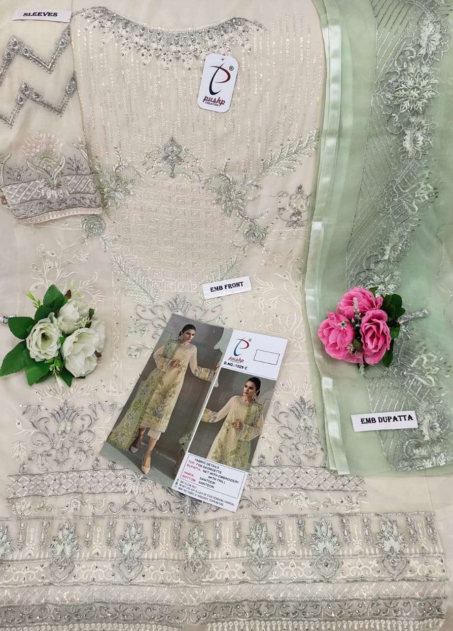 PUSHP HIT DESIGN 1029 COLOURS BY PUSHP CREATION 1029-A TO 1029-D SERIES DESIGNER PAKISTANI SUITS BEAUTIFUL STYLISH FANCY COLORFUL PARTY WEAR & OCCASIONAL WEAR NET EMBROIDERED DRESSES AT WHOLESALE PRICE